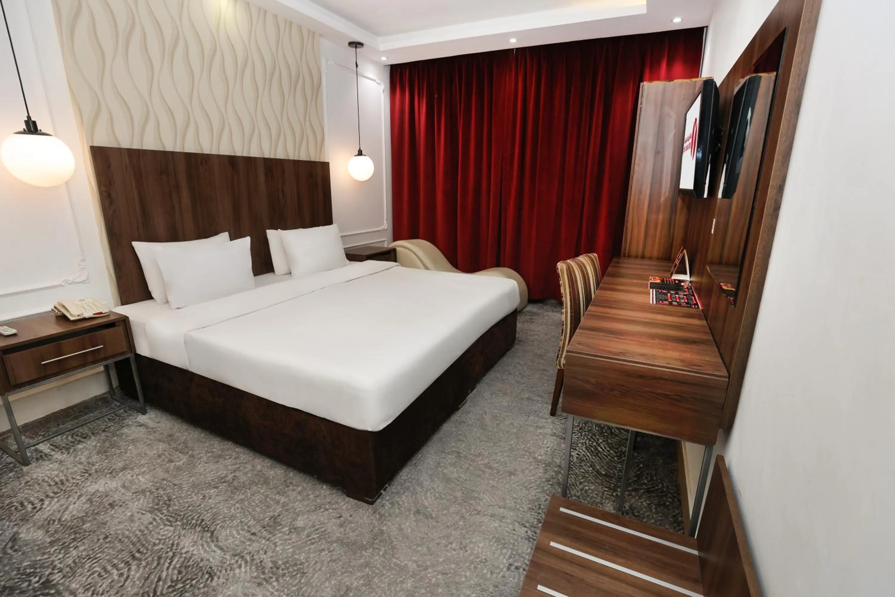 Bedroom in Reef Global Hotel