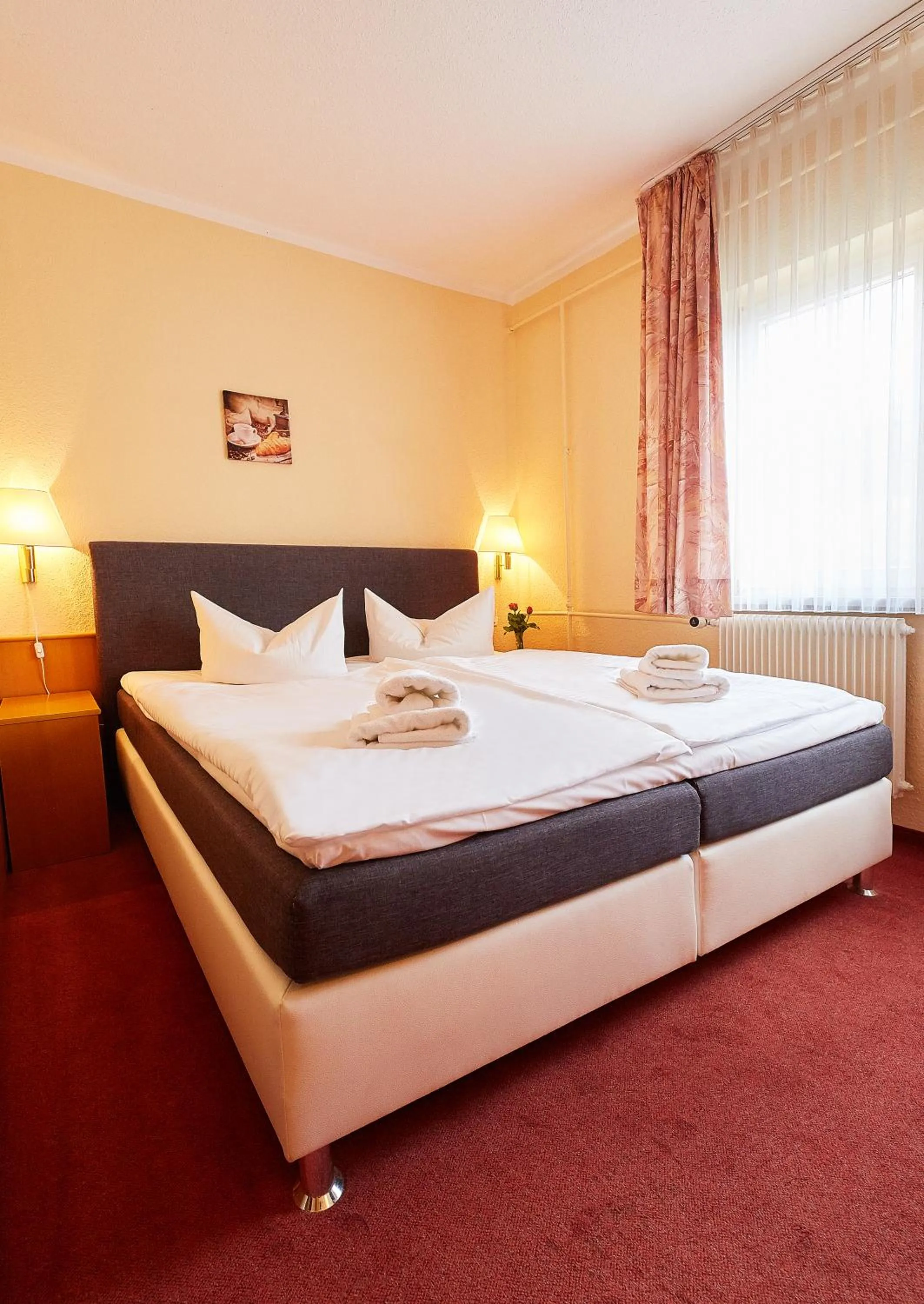 Photo of the whole room, Bed in HarzHotel Güntersberge