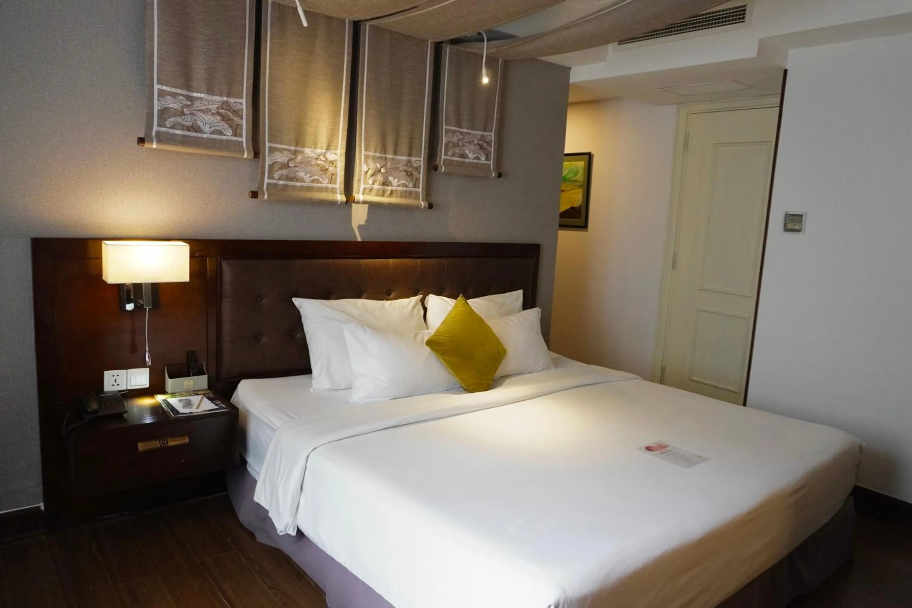 Bed in The Odys Boutique Hotel