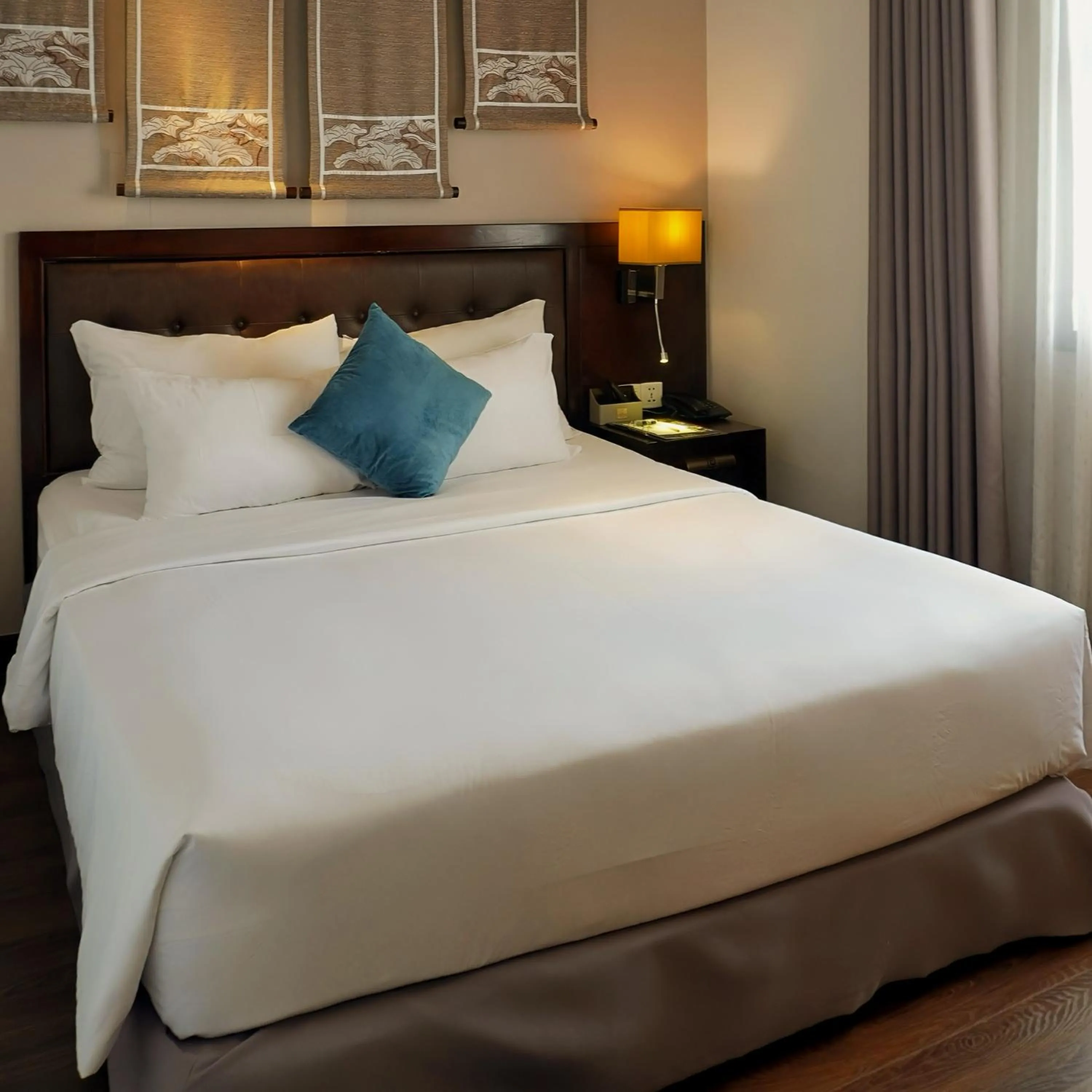 Bed in The Odys Boutique Hotel