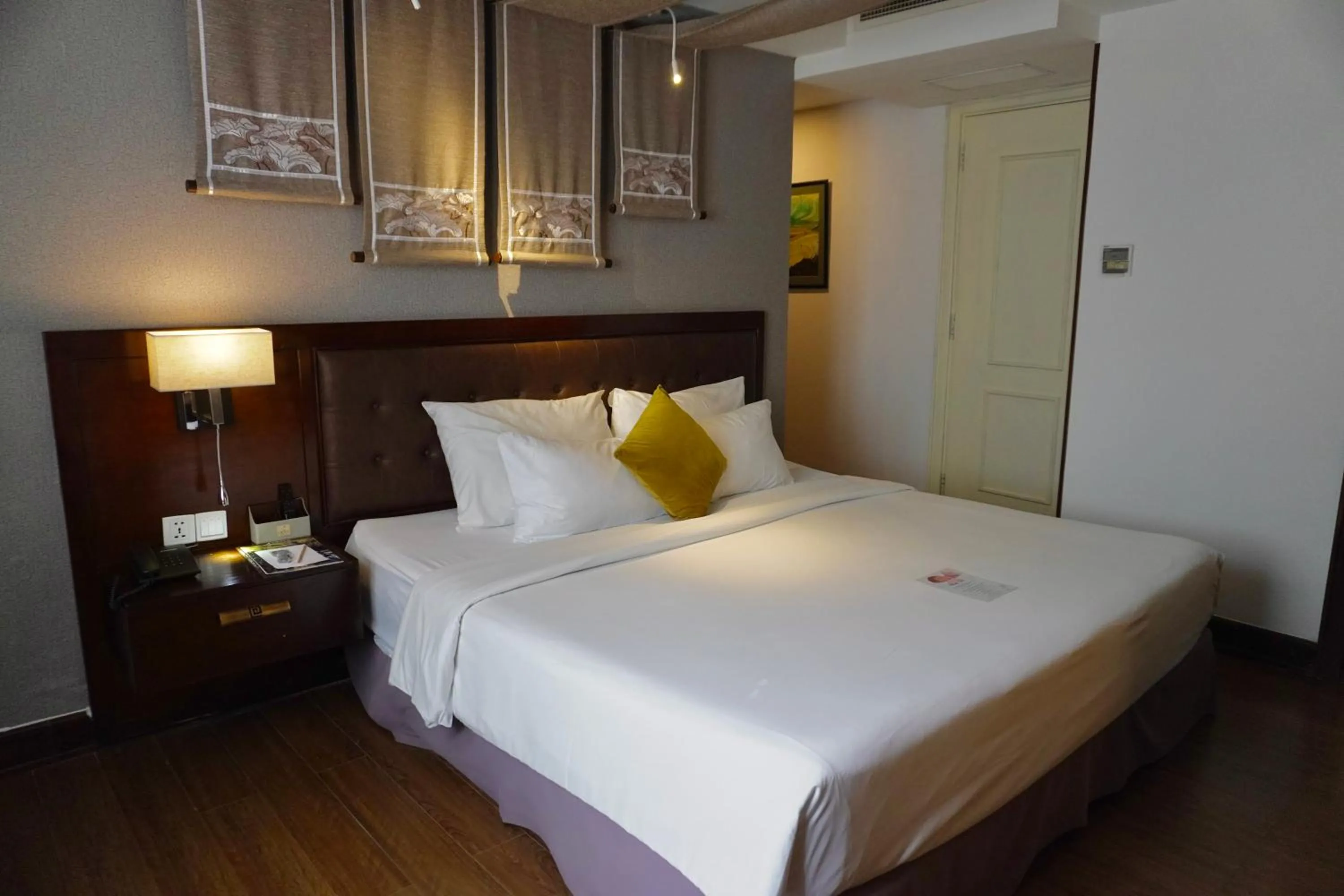 Bed in The Odys Boutique Hotel