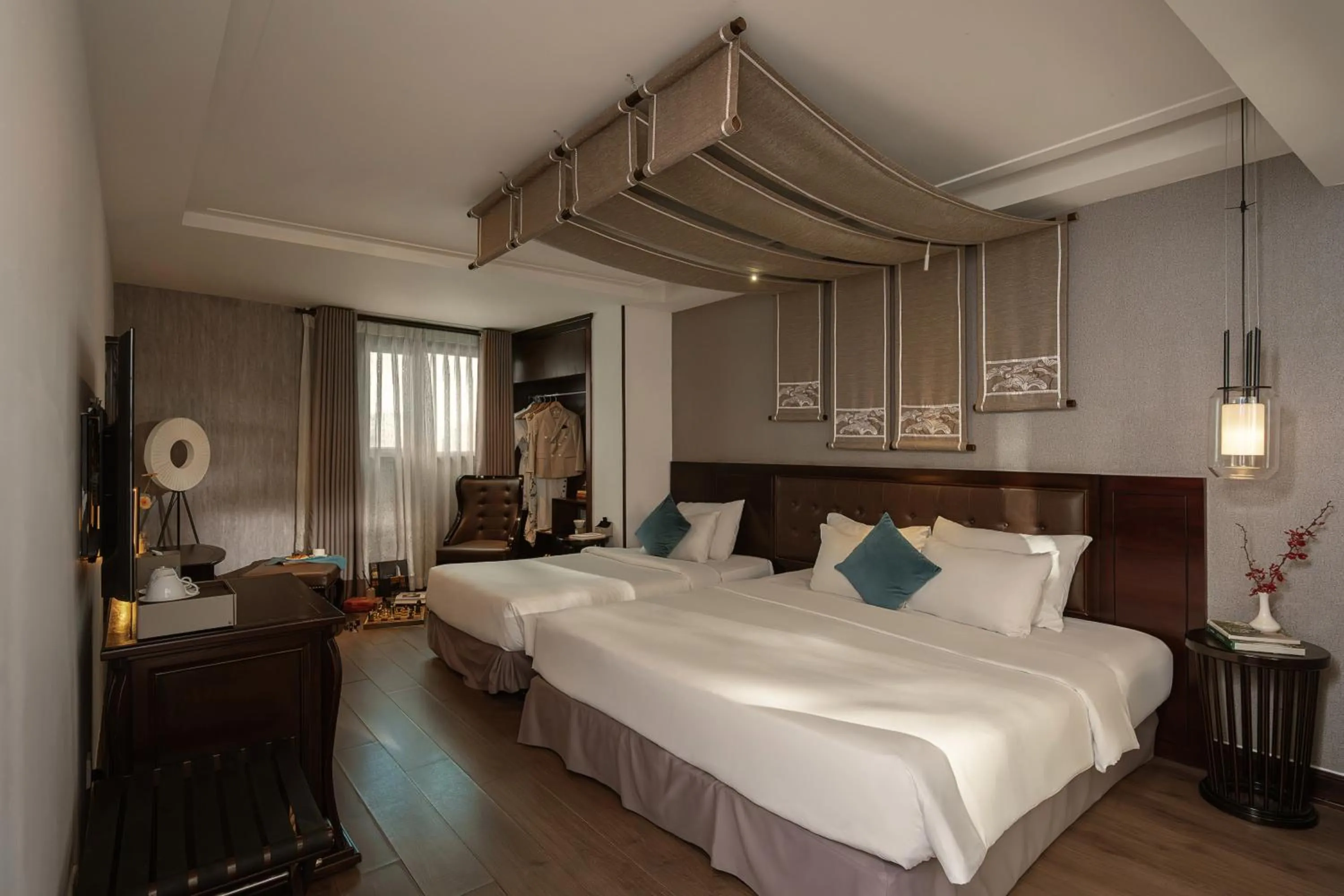 Bed in The Odys Boutique Hotel