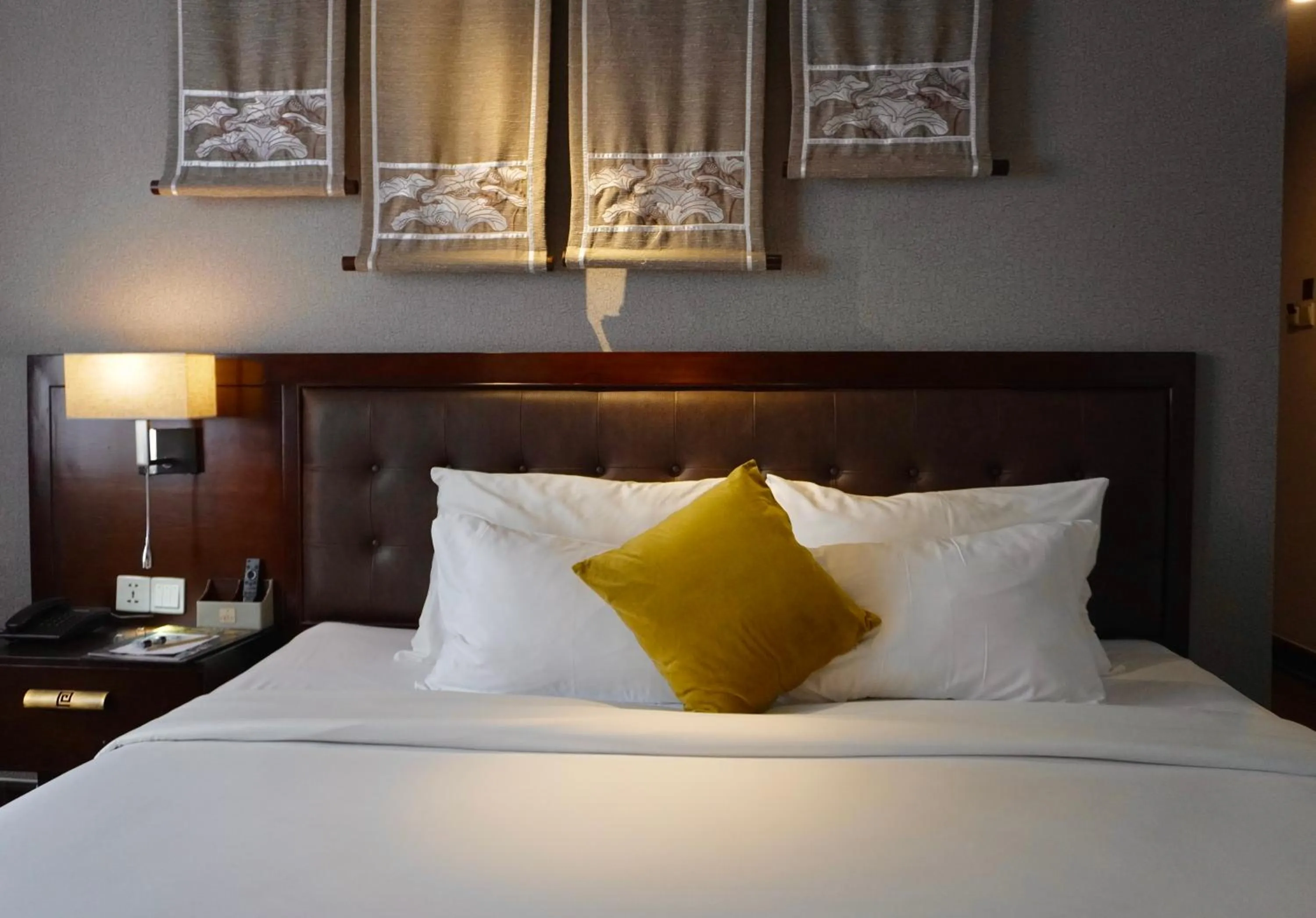 Bed in The Odys Boutique Hotel