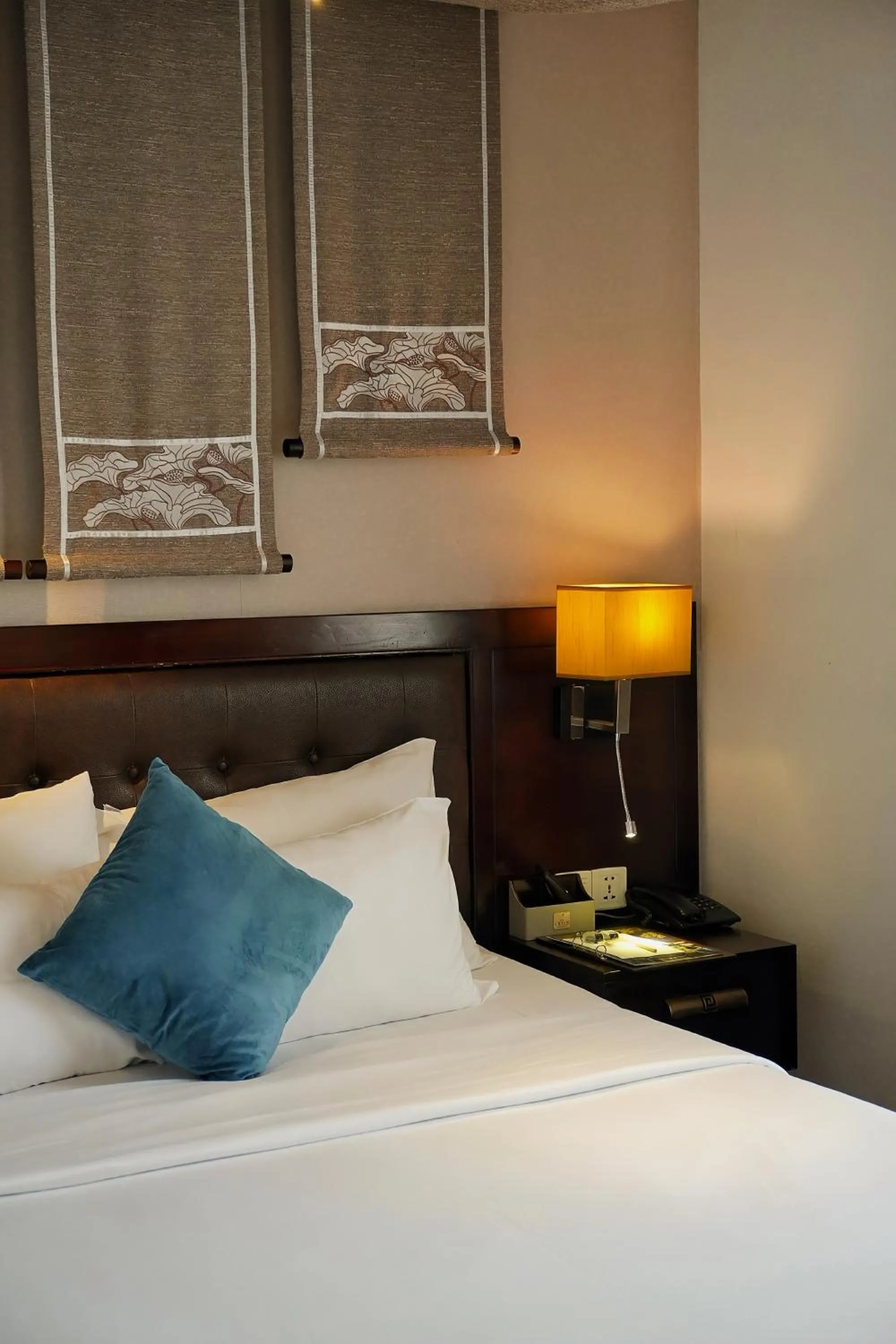 Bed in The Odys Boutique Hotel