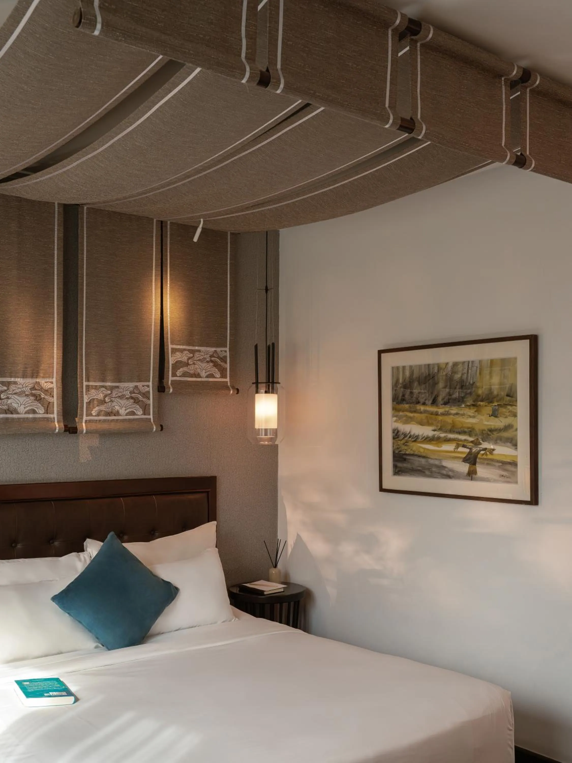 Bed in The Odys Boutique Hotel