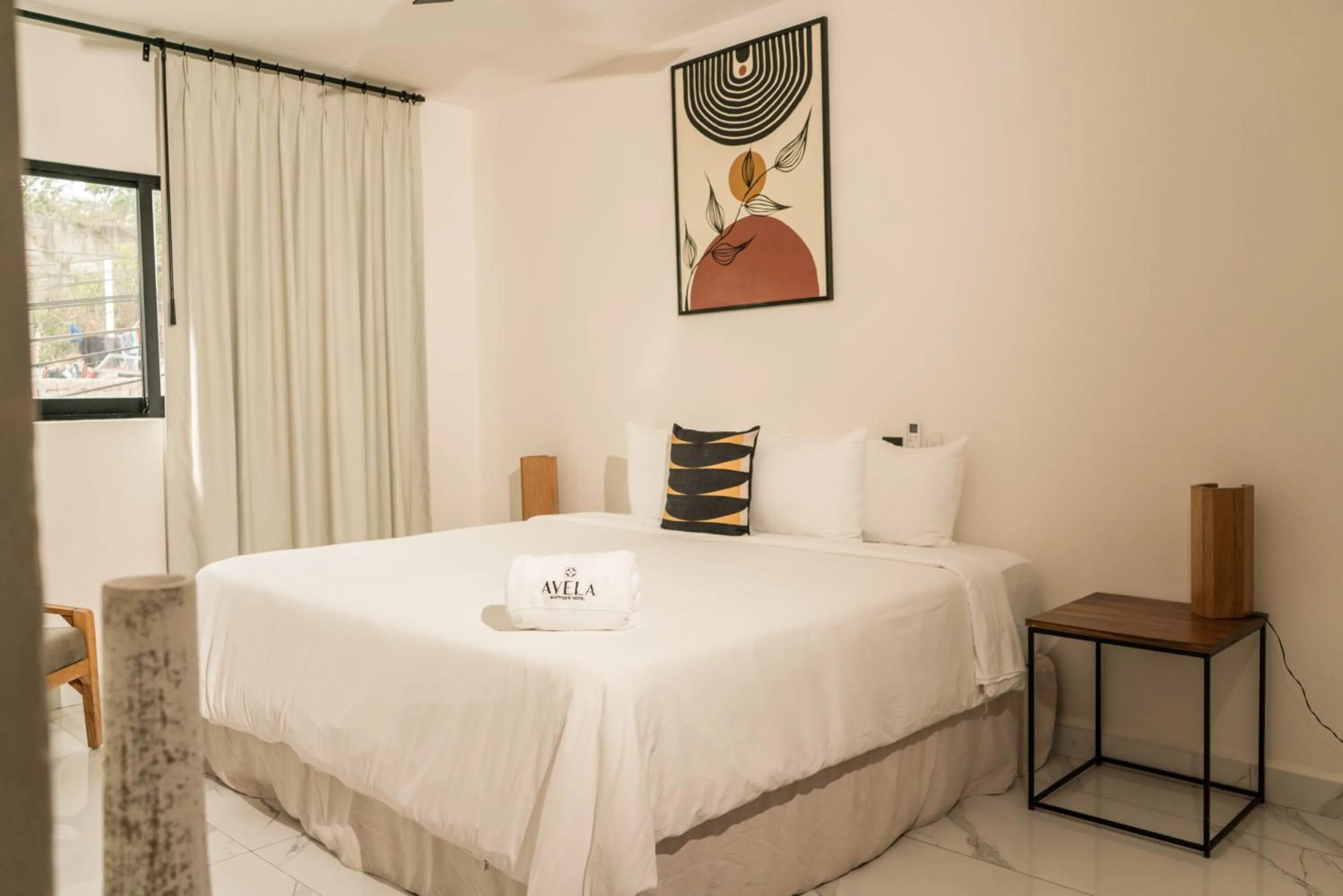 Bed in Avela Boutique Hotel