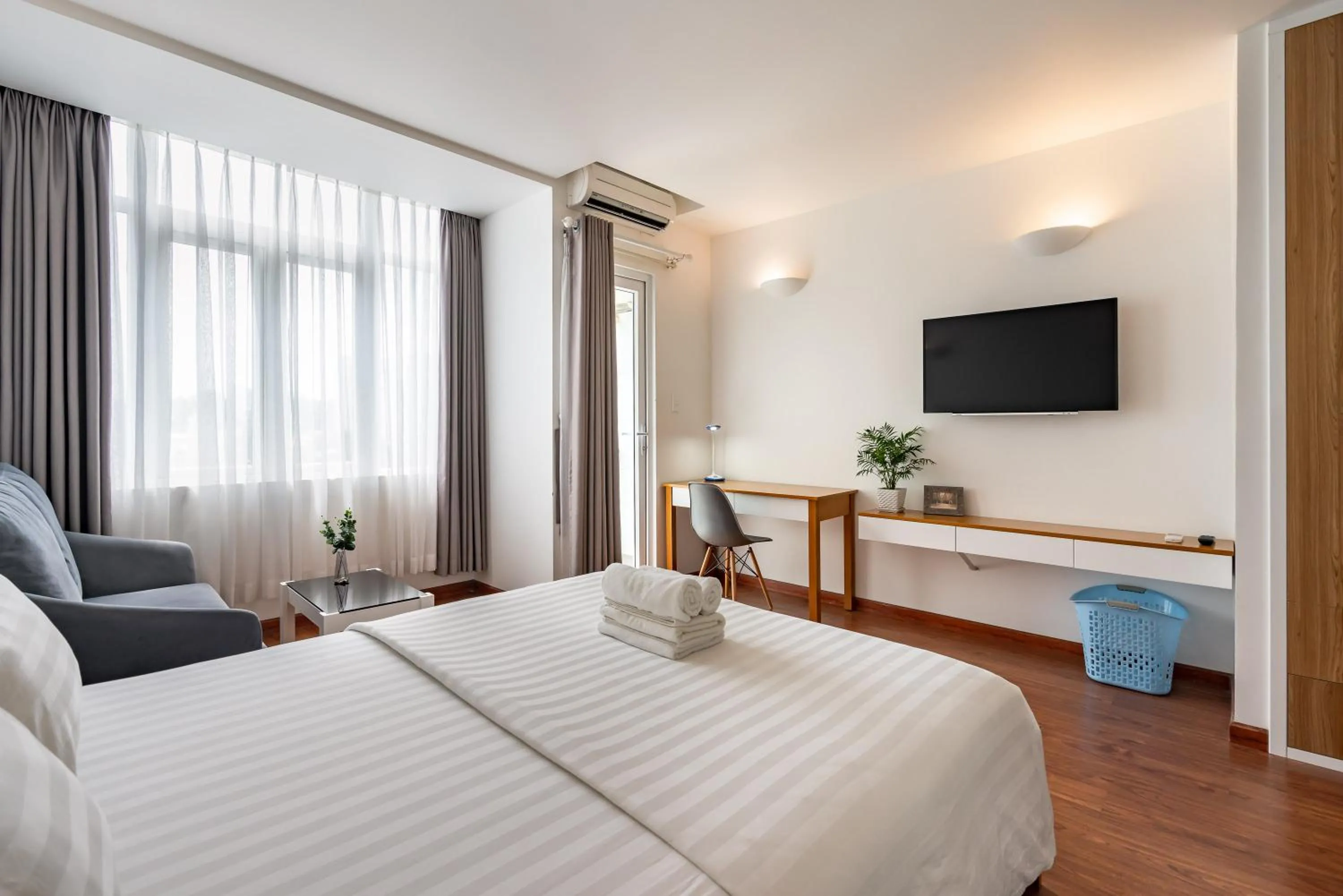 TV and multimedia, Bed in SaigonOne Serviced Apartment