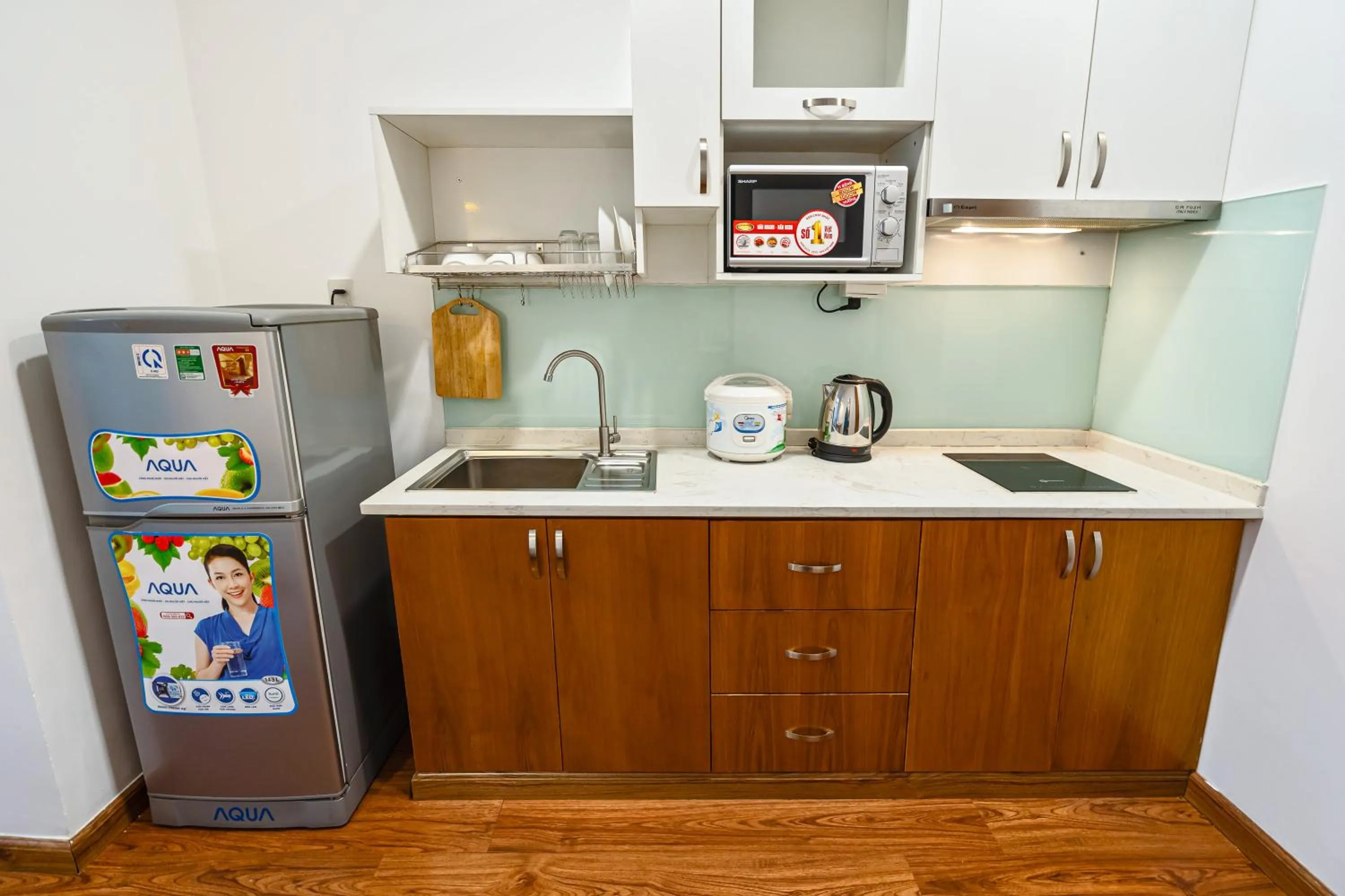 Kitchen or kitchenette in SaigonOne Serviced Apartment