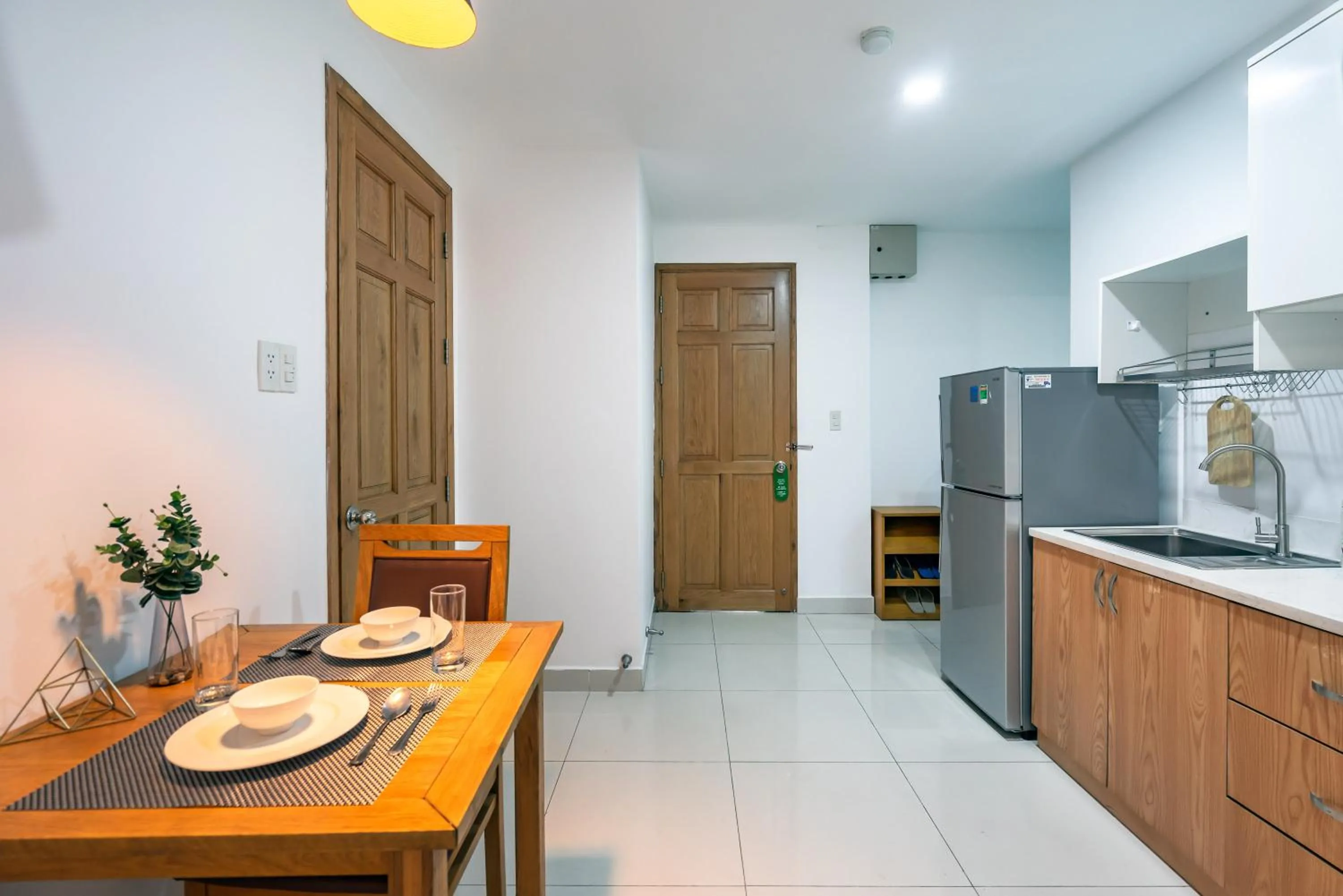 Kitchen or kitchenette in SaigonOne Serviced Apartment