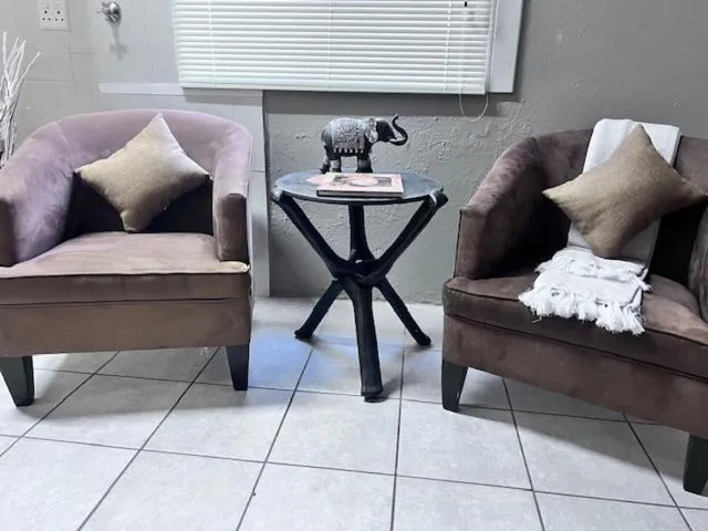 Communal lounge/ TV room in Turaco Lodge - No Loadshedding