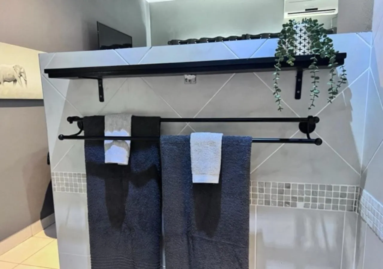 Bathroom in Turaco Lodge - No Loadshedding