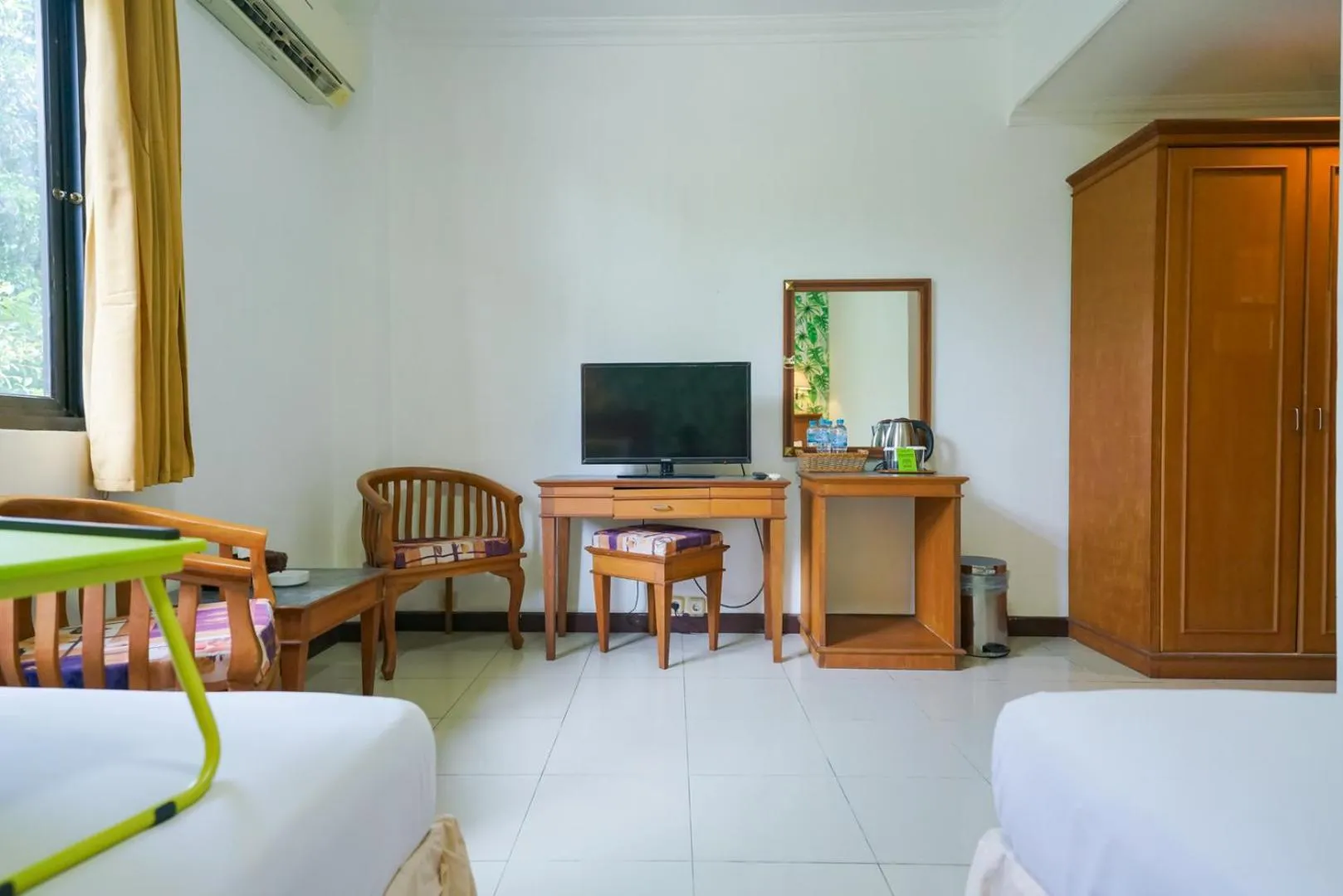 Seating area, Bed in Urbanview by Millenium Hotel