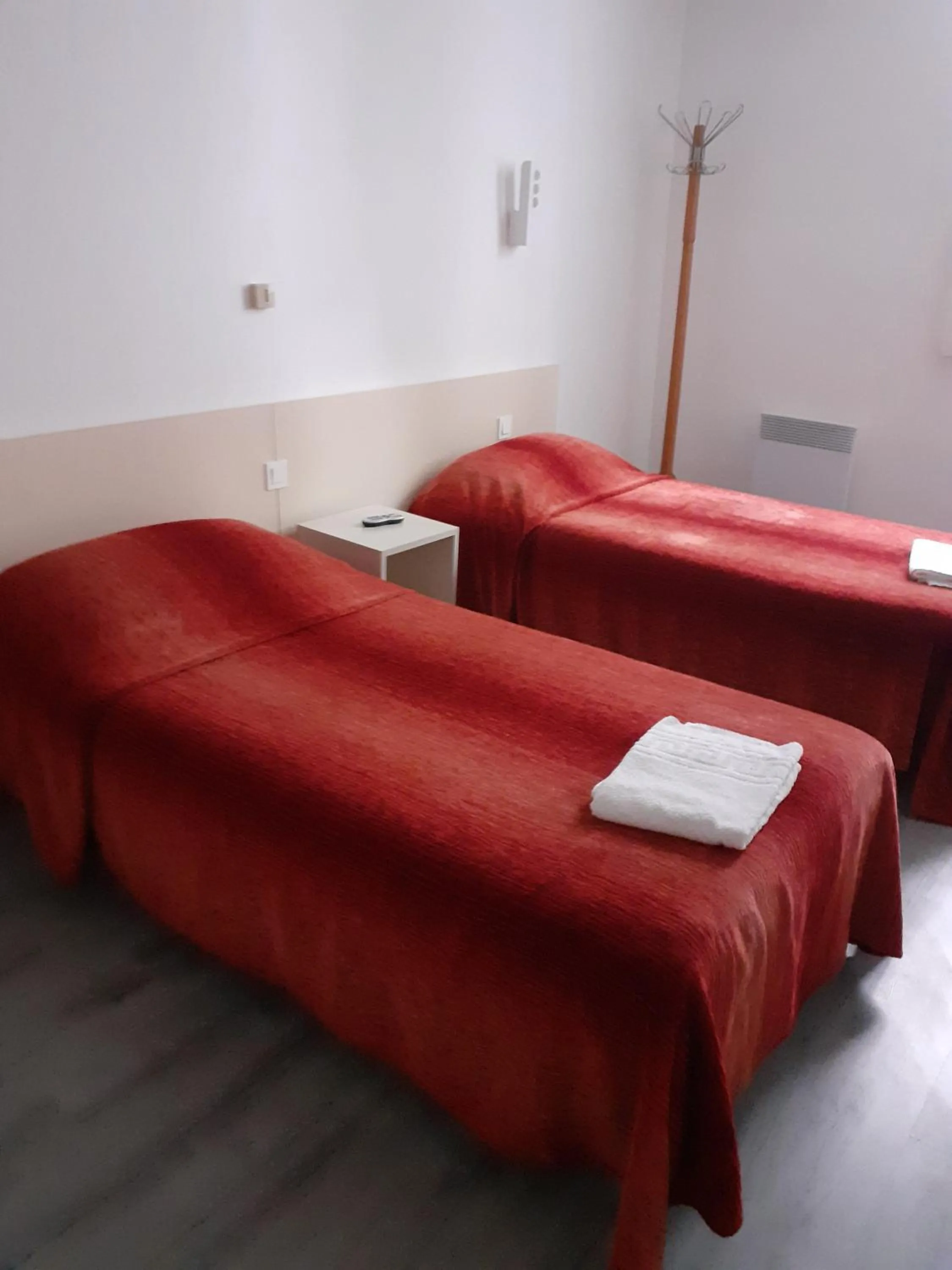 Bed in Hôtel Croix des Nordistes