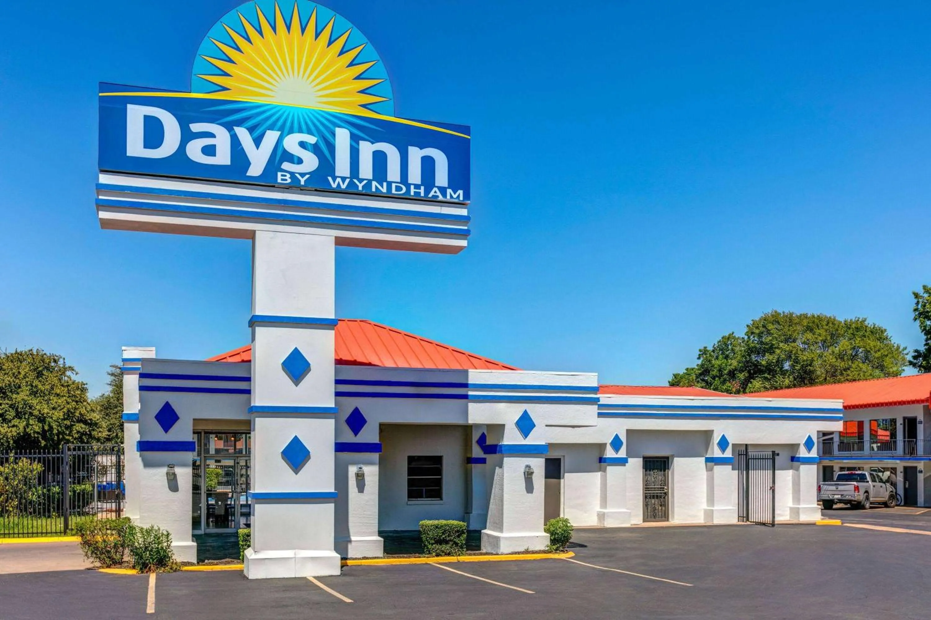 Property building in Days Inn by Wyndham South Fort Worth