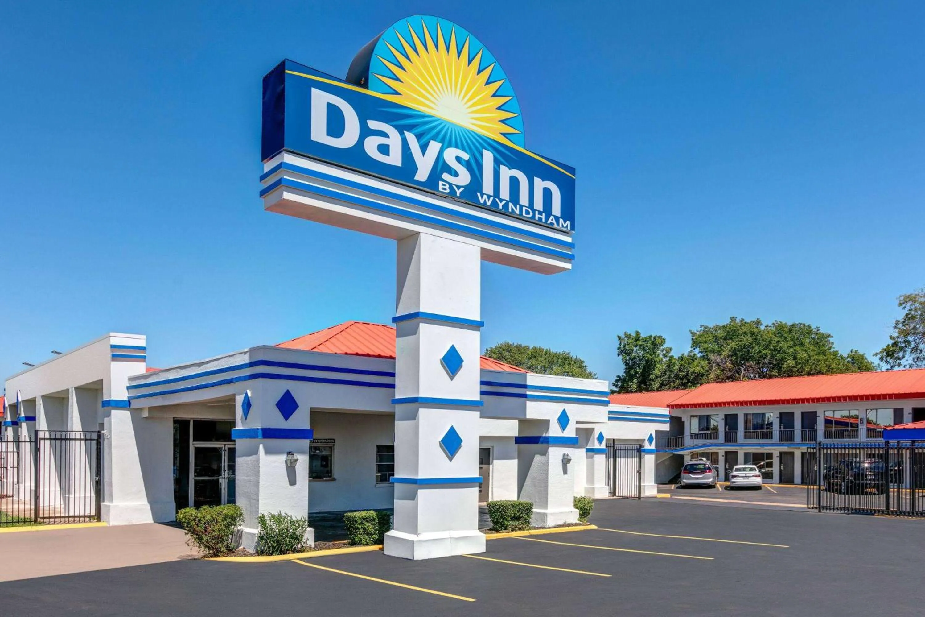 Property building in Days Inn by Wyndham South Fort Worth