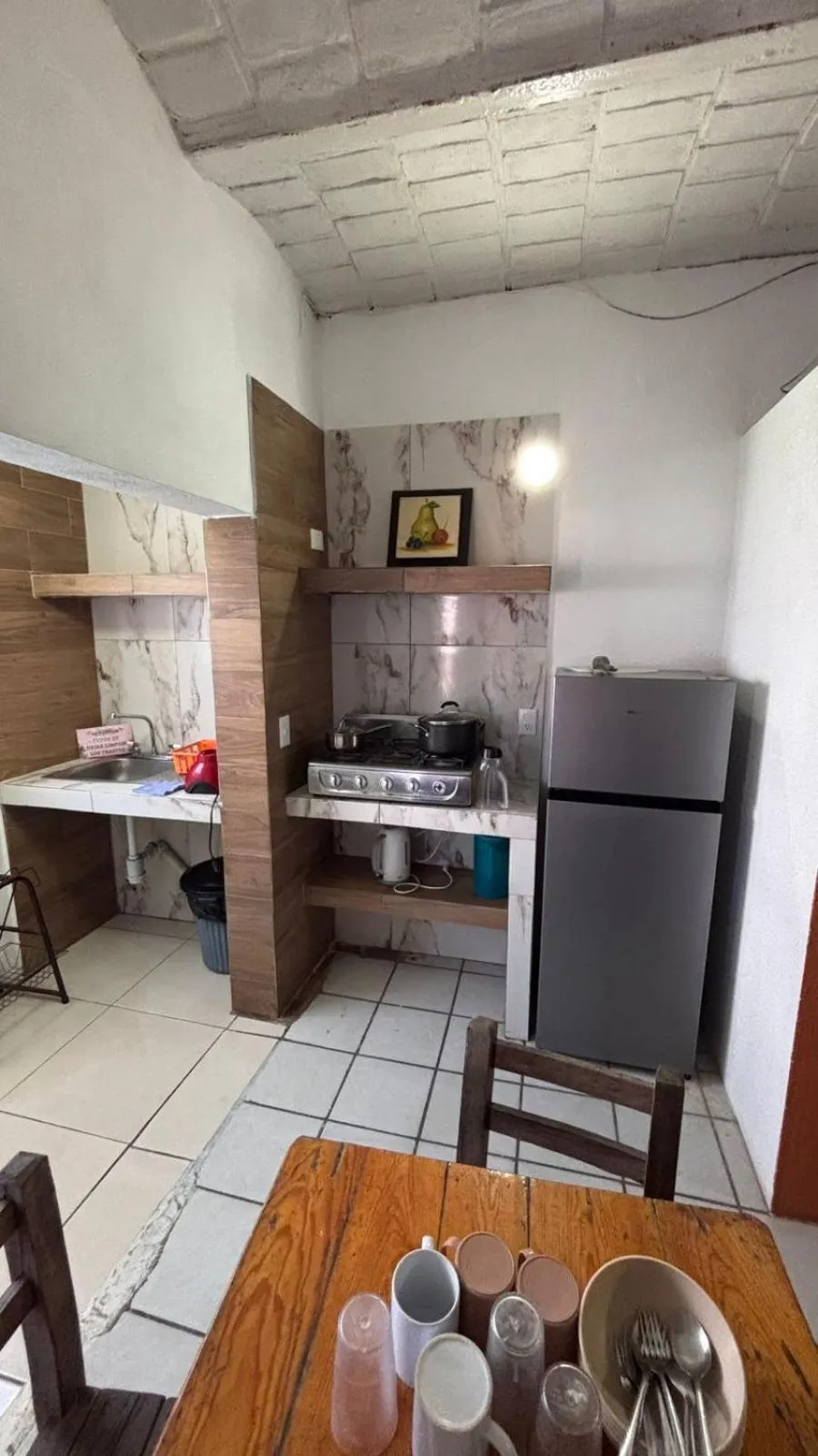 Kitchen or kitchenette in Bungalows Flamingos