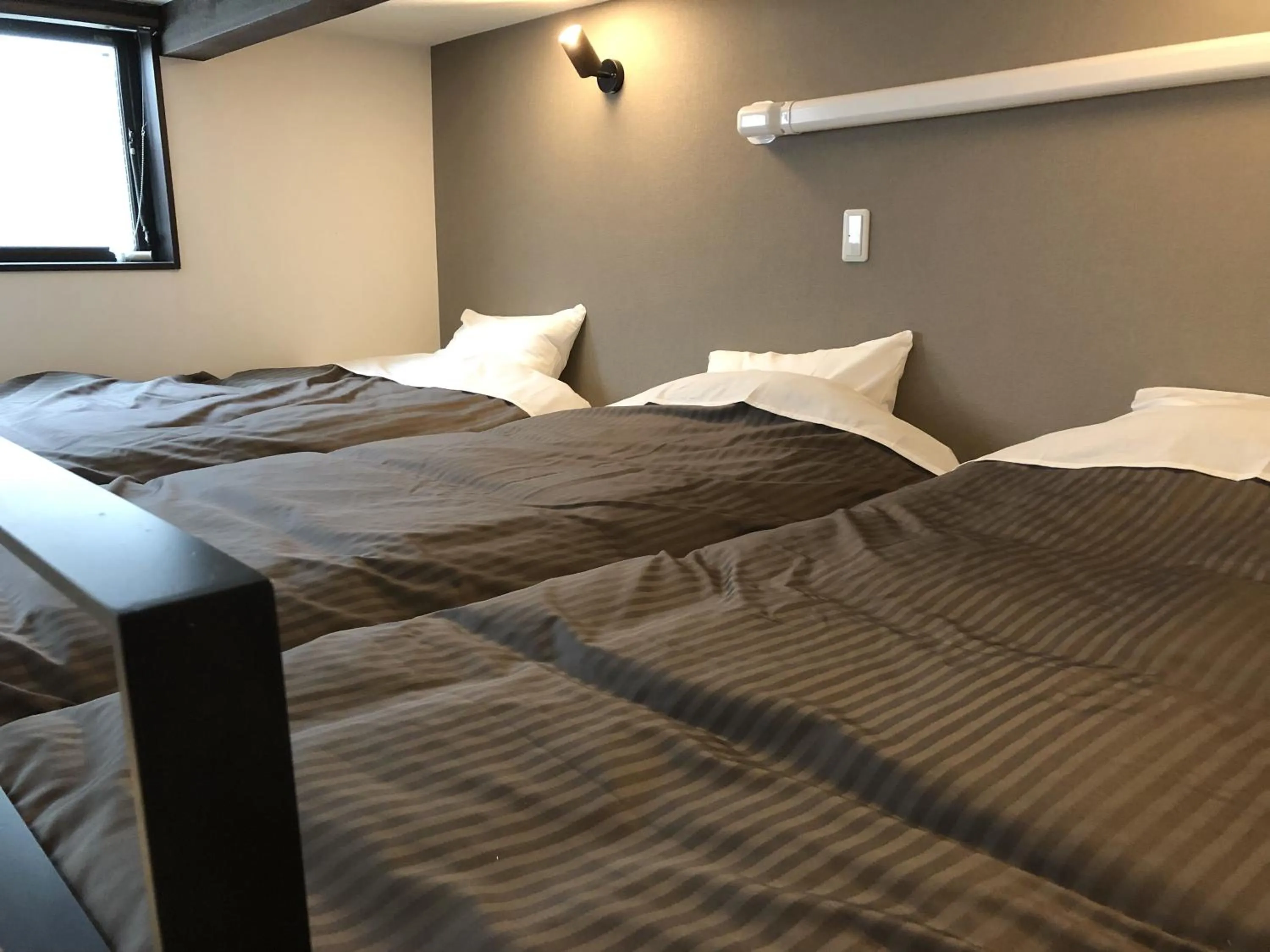 Bed in Hotel Tohko HakataGion