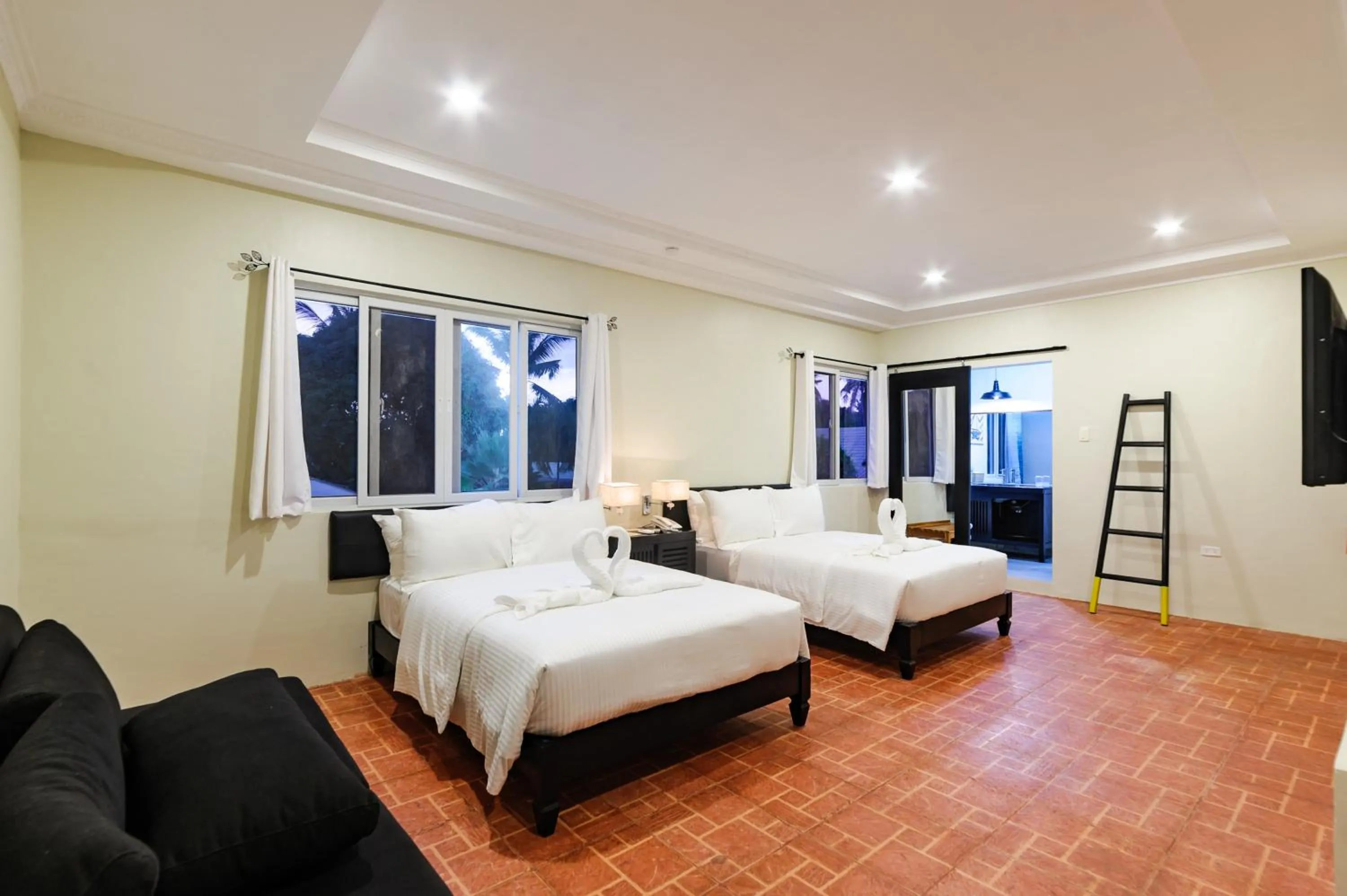 Photo of the whole room, Bed in Mario Dive Resort