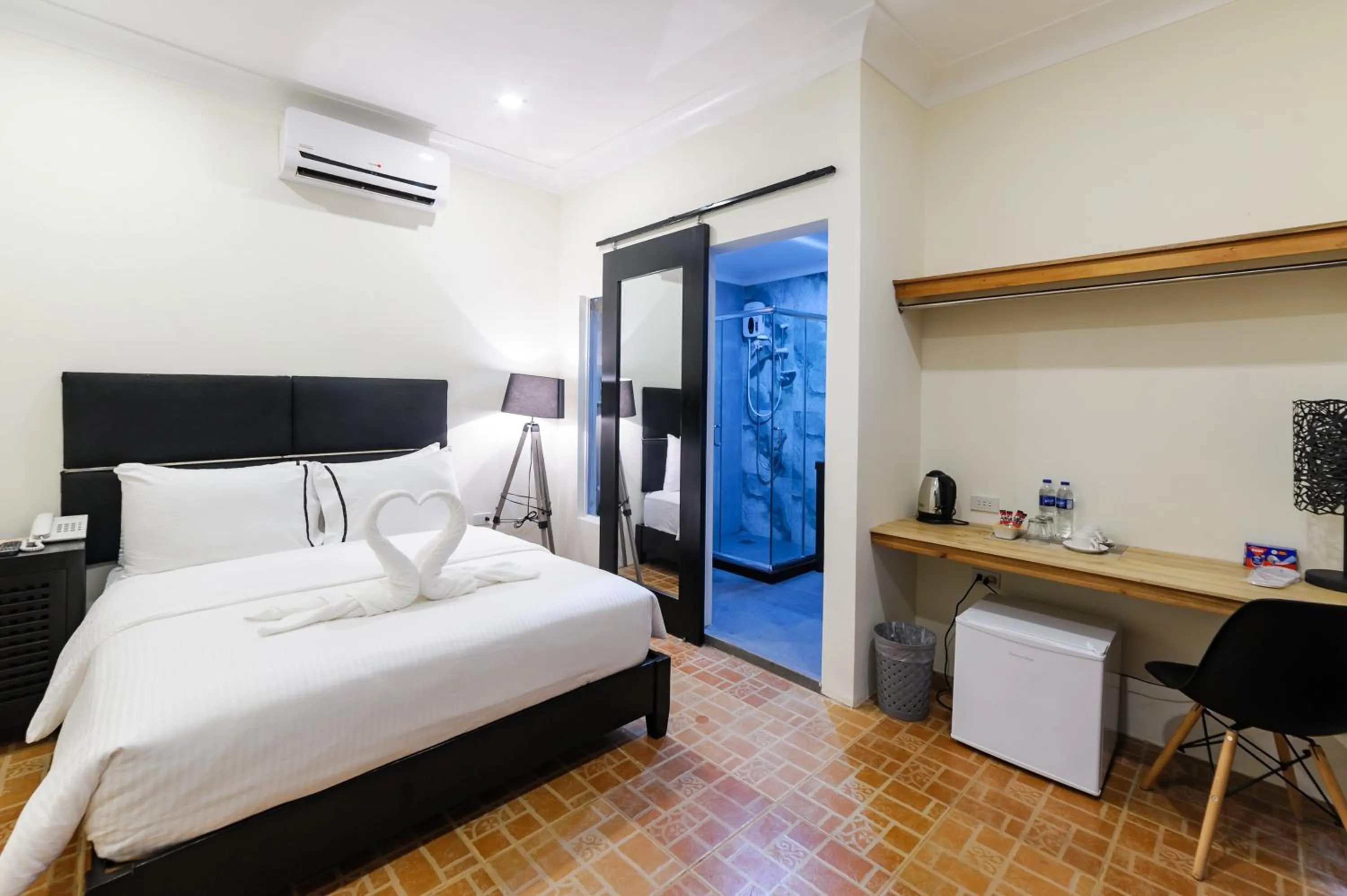 Bed in Mario Dive Resort