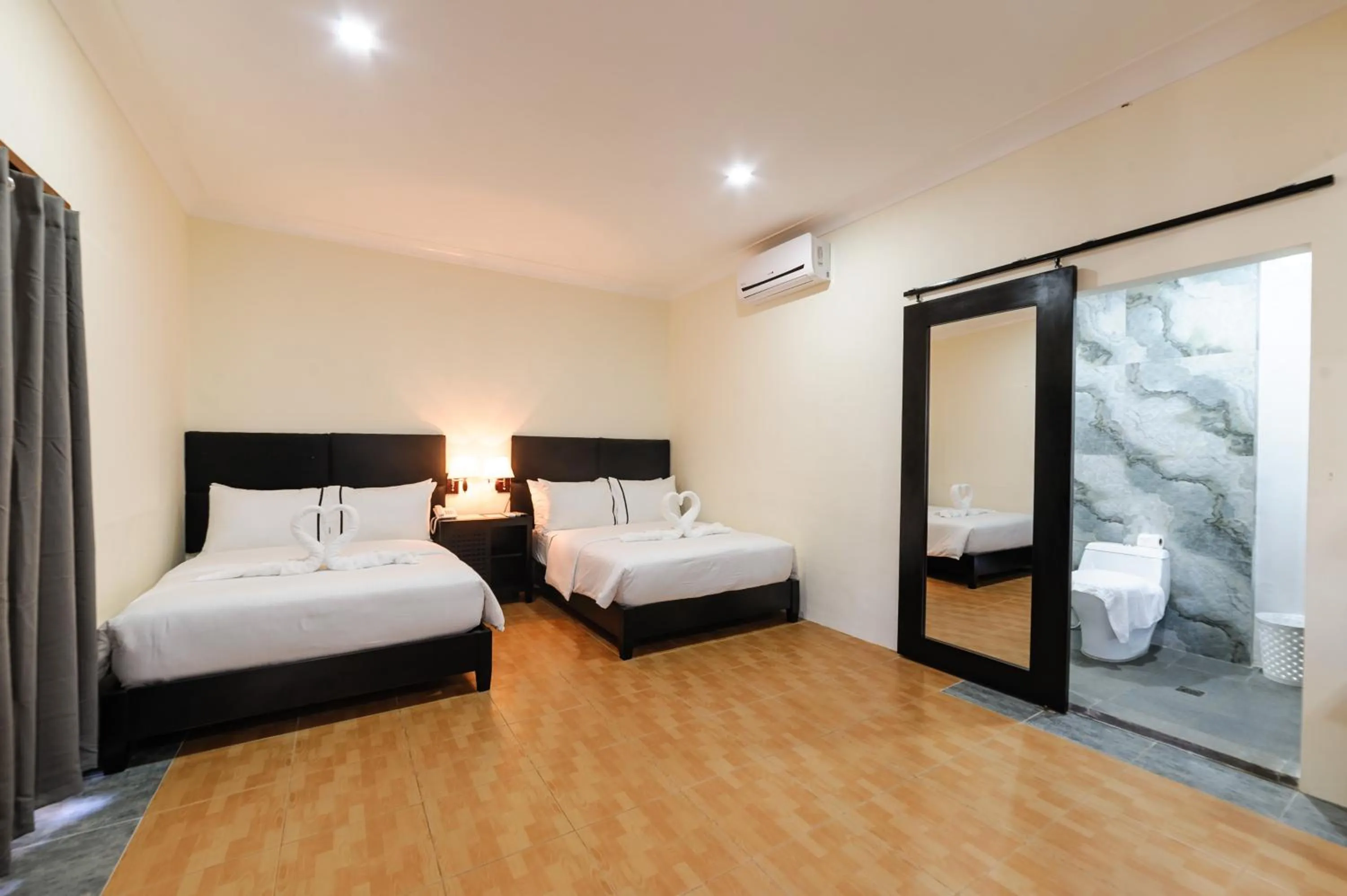 Photo of the whole room, Bed in Mario Dive Resort