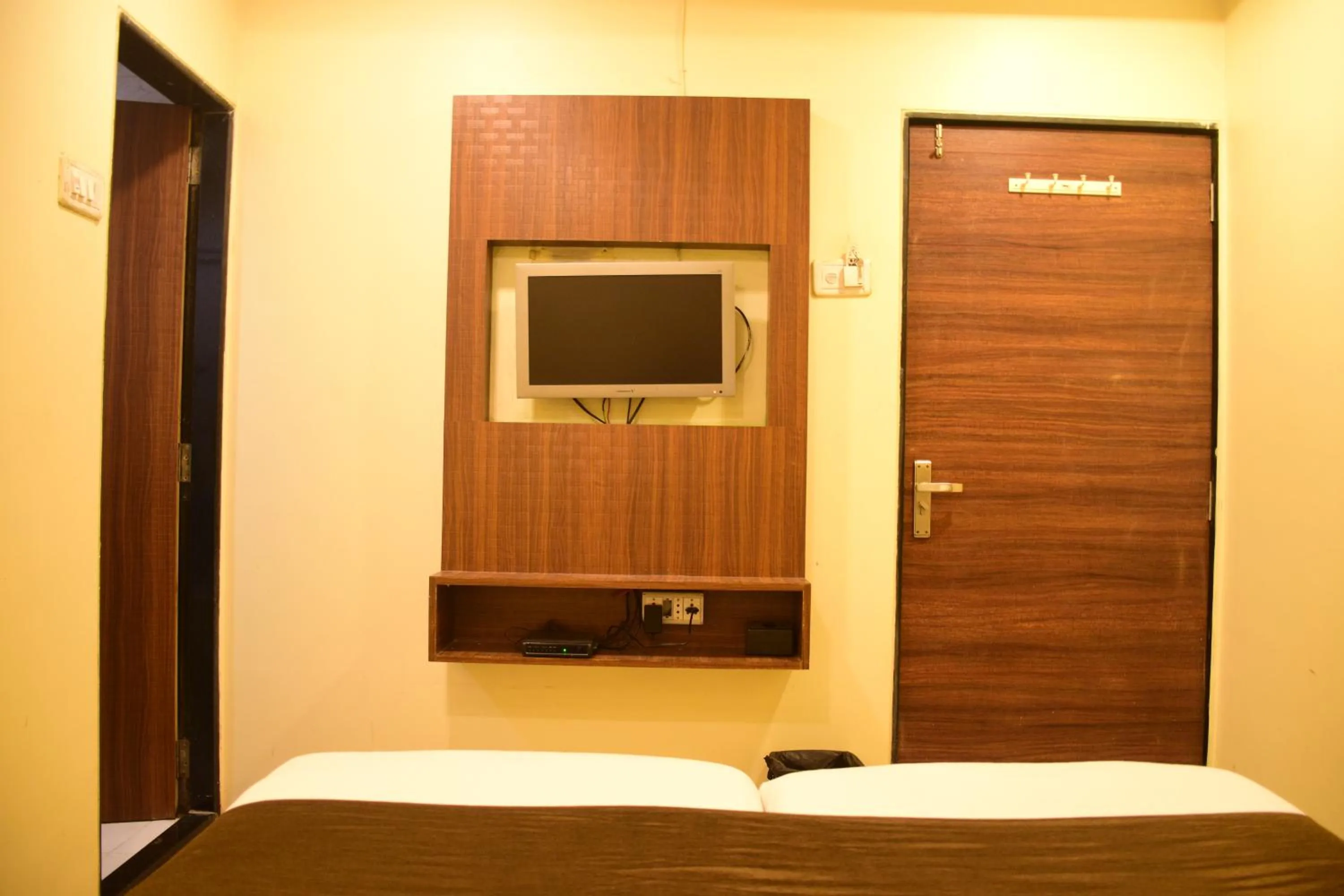 Bed in Hotel K.C Residency