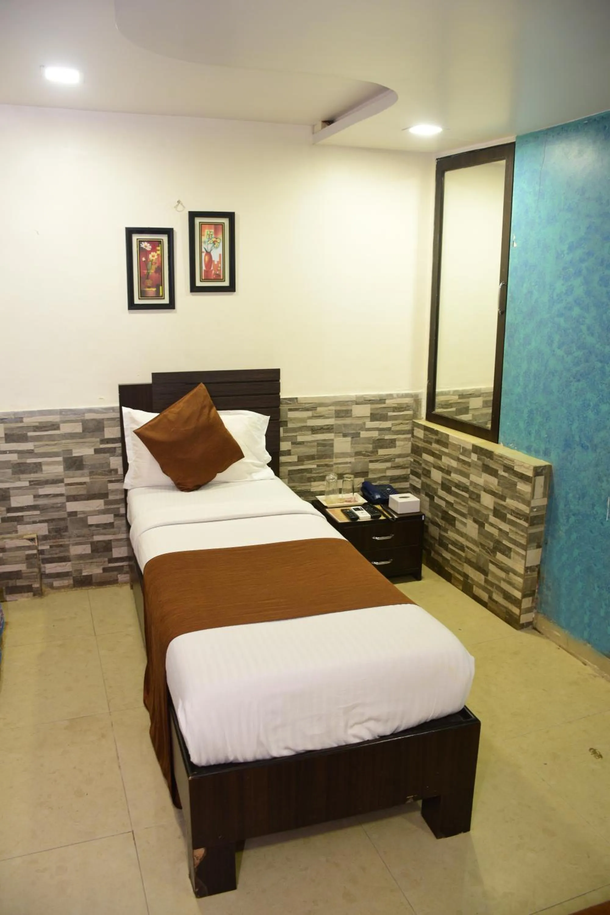 Bed in Hotel K.C Residency