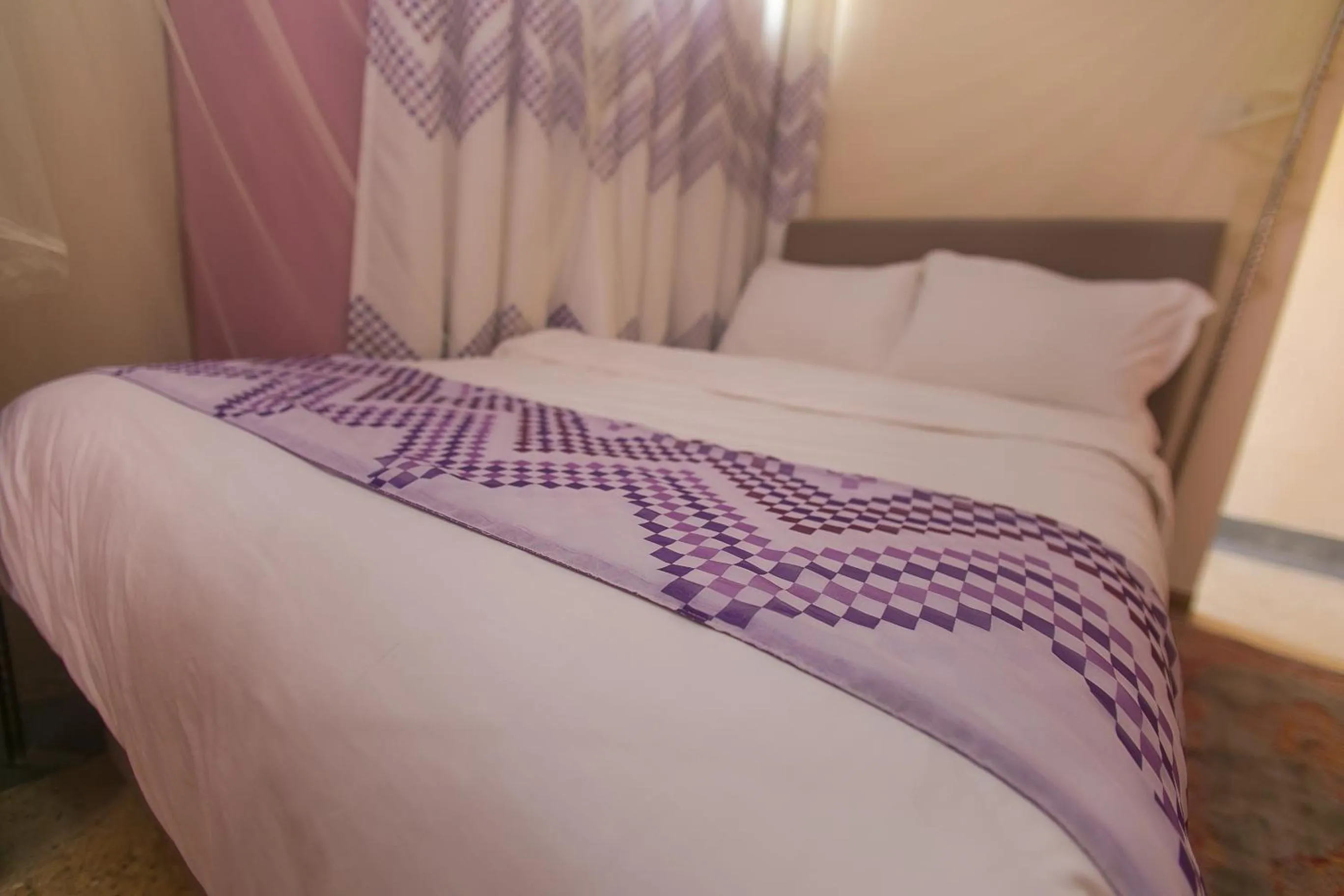 Bed in Zarita Boutique Hotel