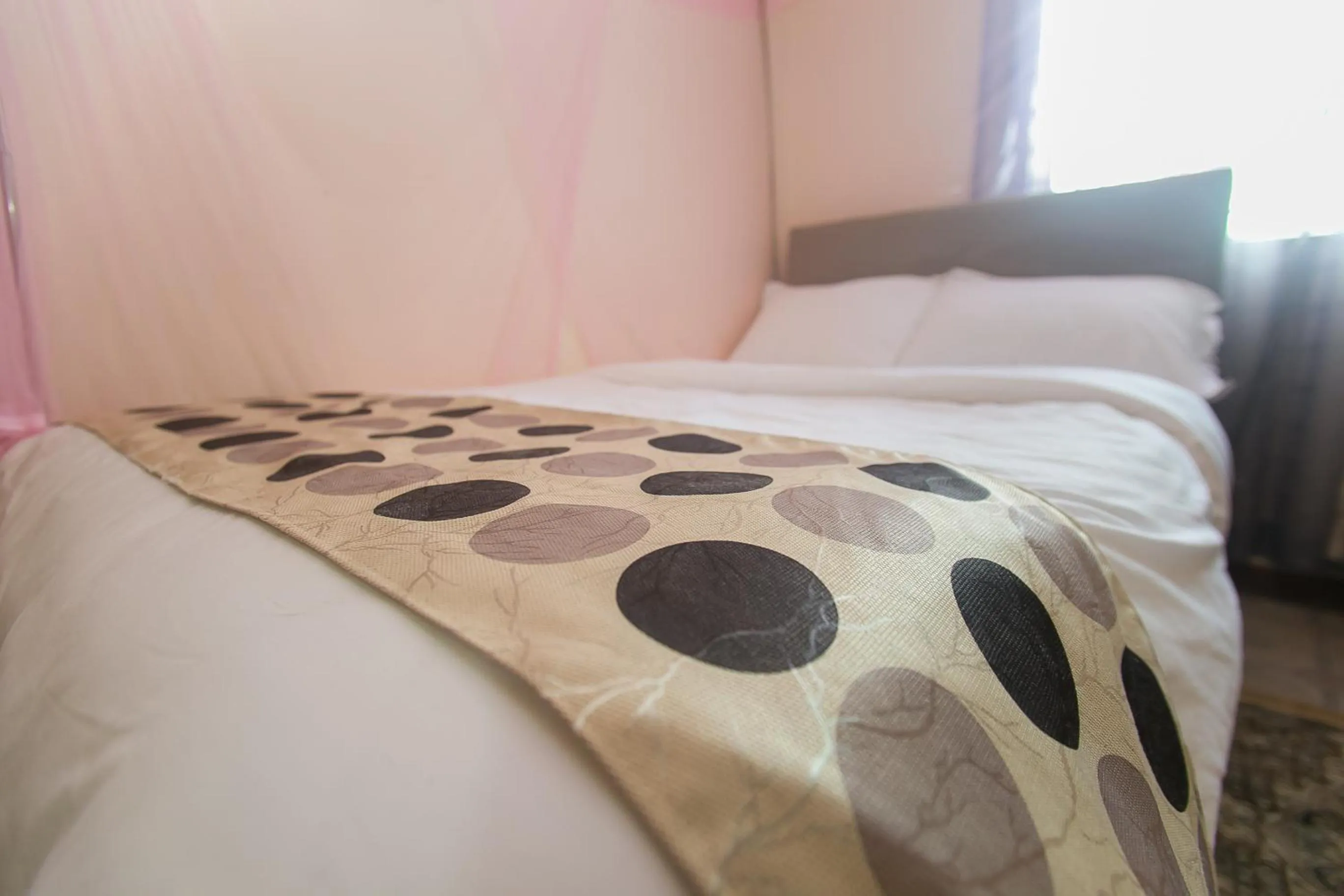 Bed in Zarita Boutique Hotel