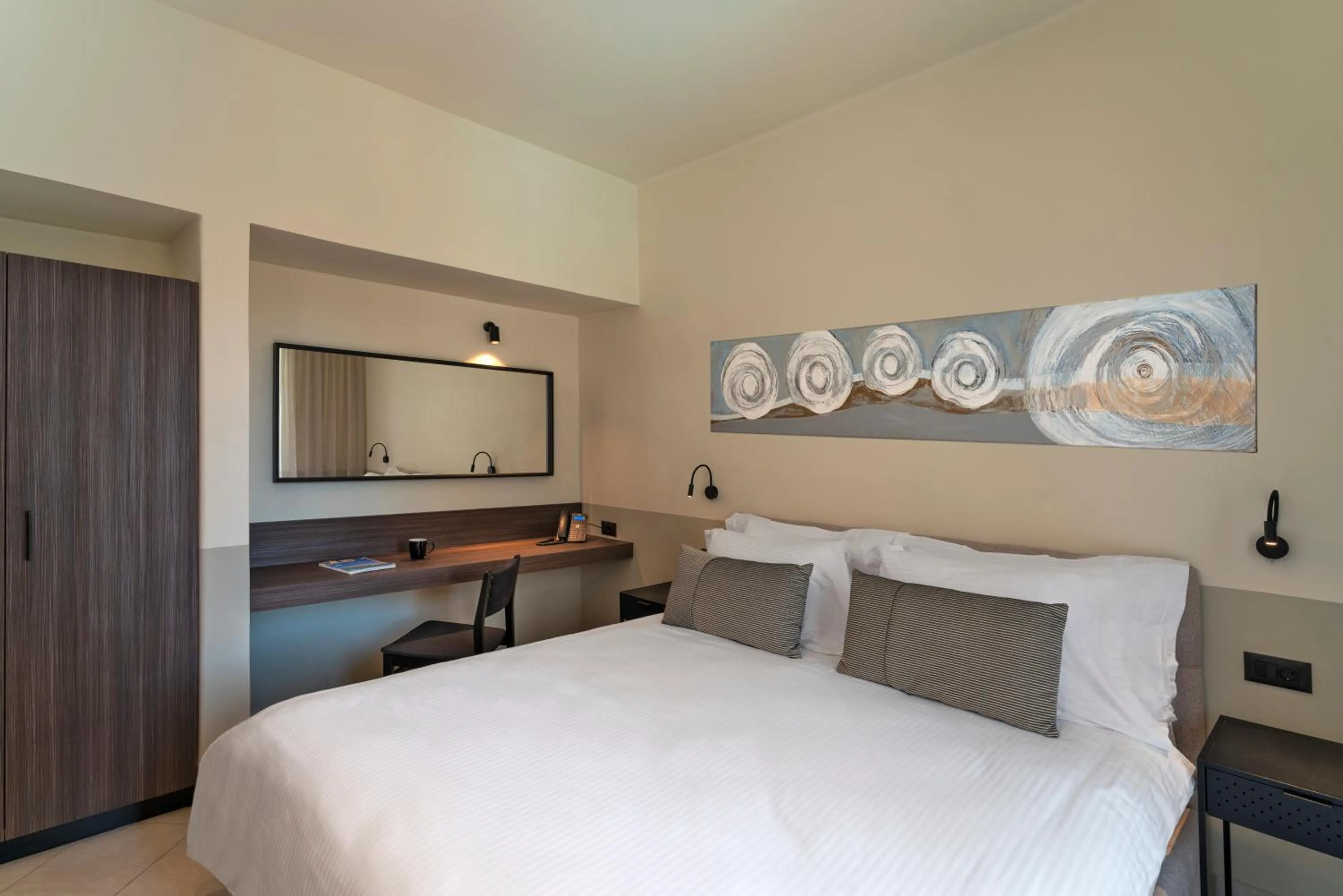 Bed in Mariette Rhodes Urban Suites