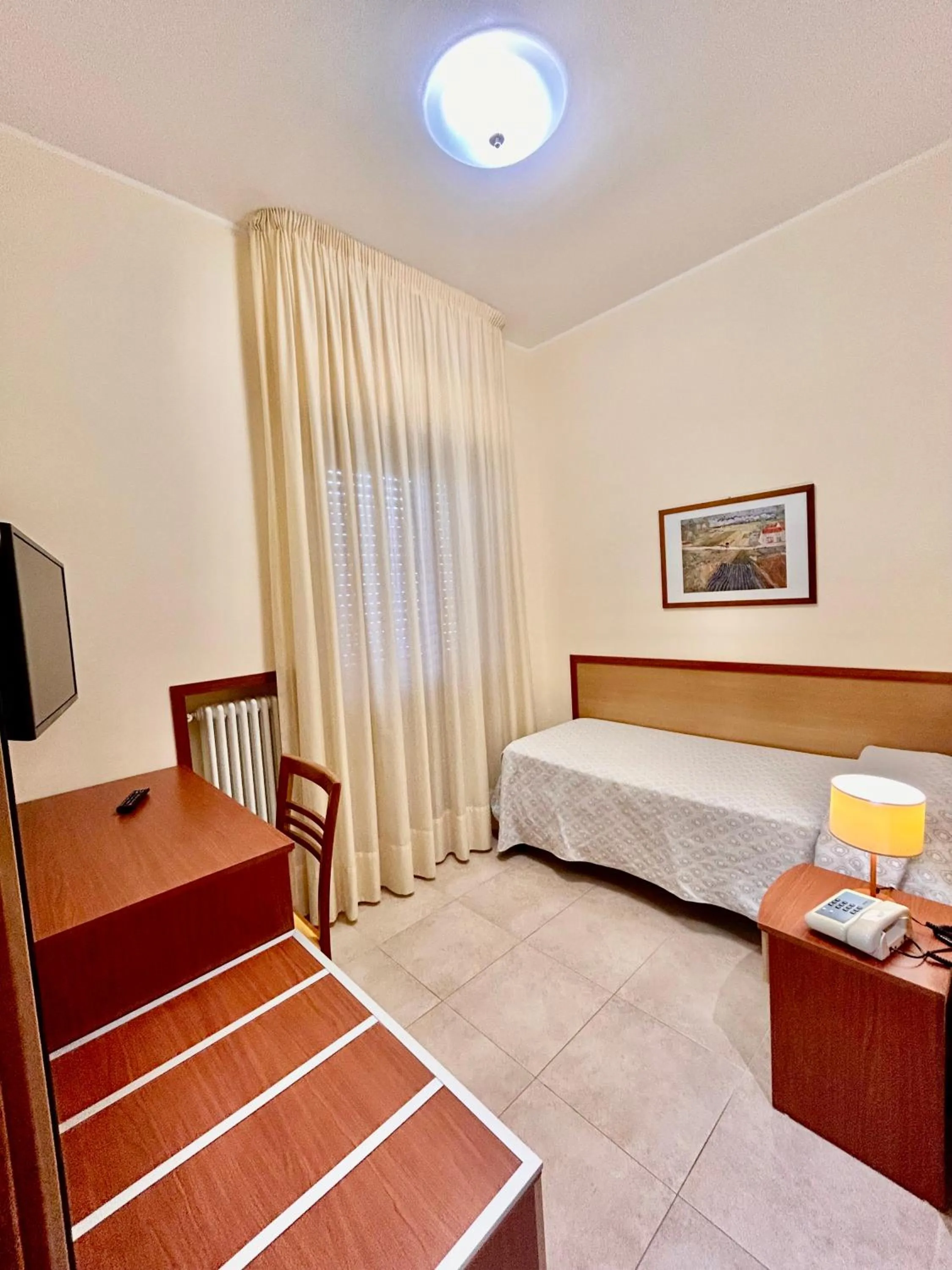 Bed in Il Nocchiero City Hotel