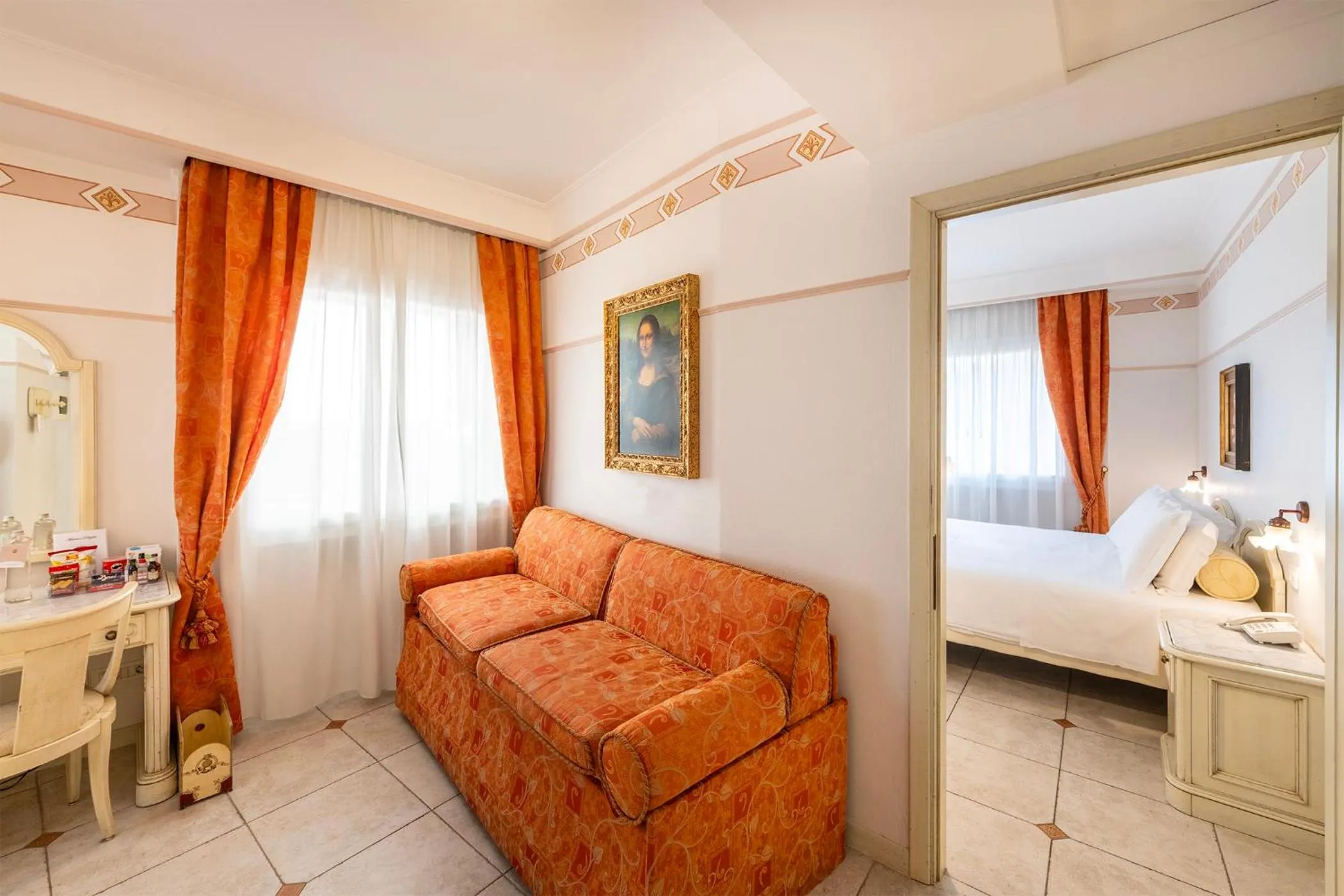 Living room, Bed in Majestic Toscanelli (centro storico)