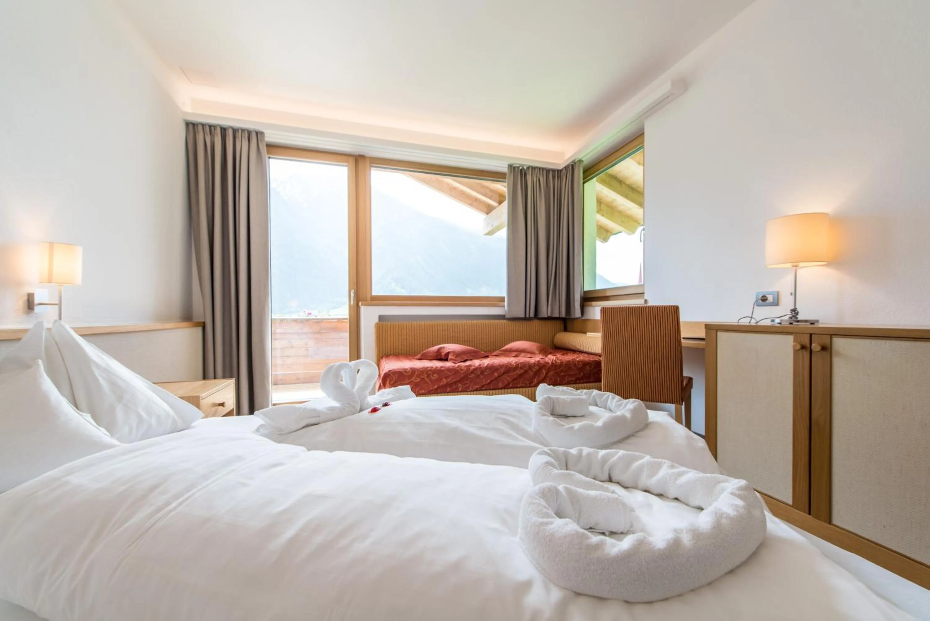 Bed in Hotel Taufers