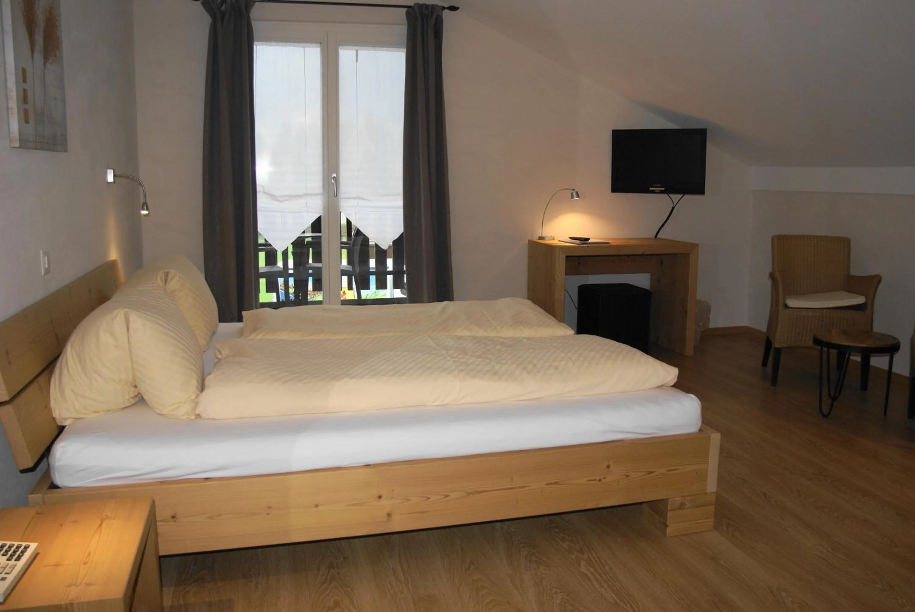 Photo of the whole room, Bed in Hotel Bad Schwarzsee