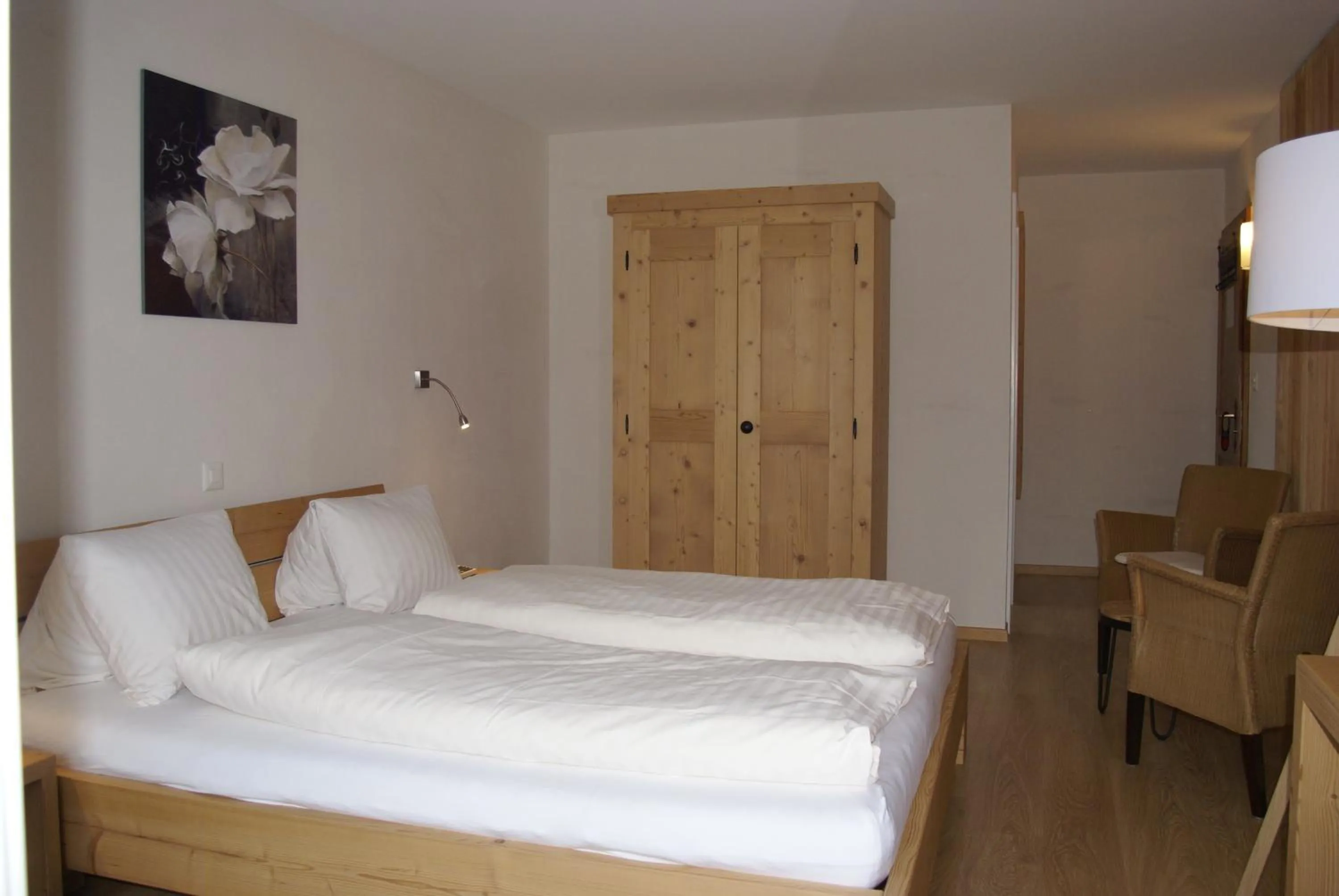 Photo of the whole room, Bed in Hotel Bad Schwarzsee