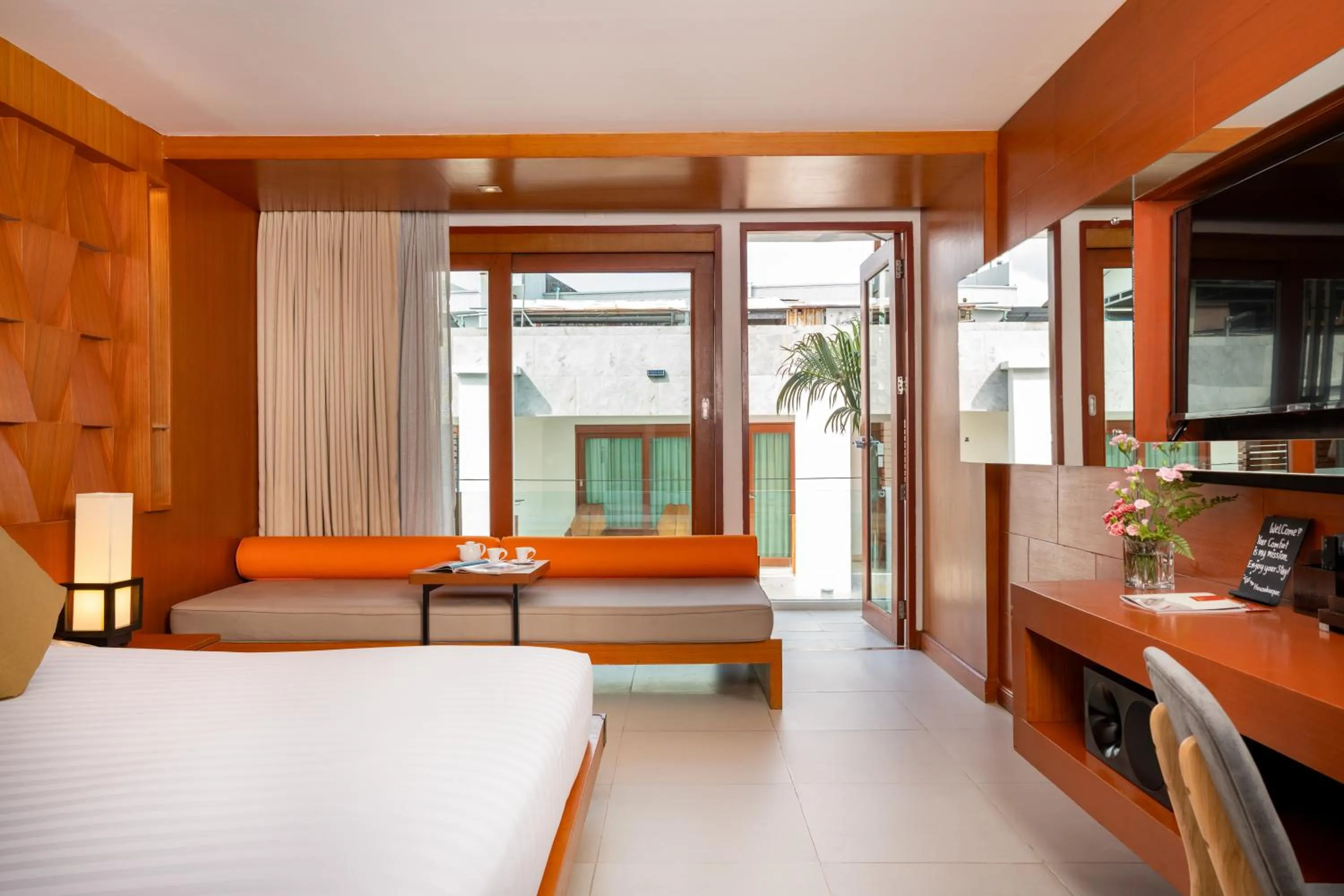 Bed in La Flora Resort Patong