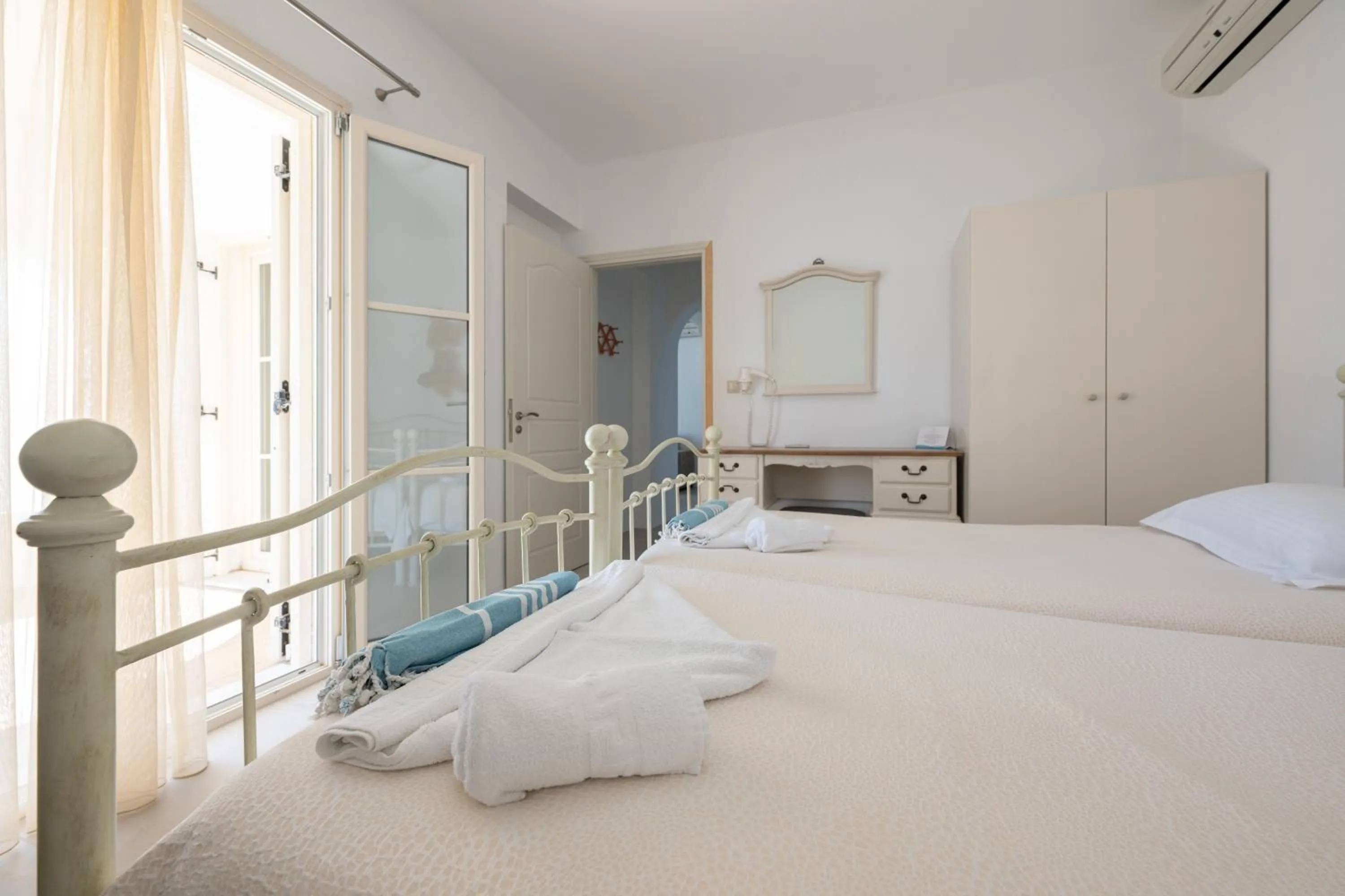 Bed in Iliada Villas