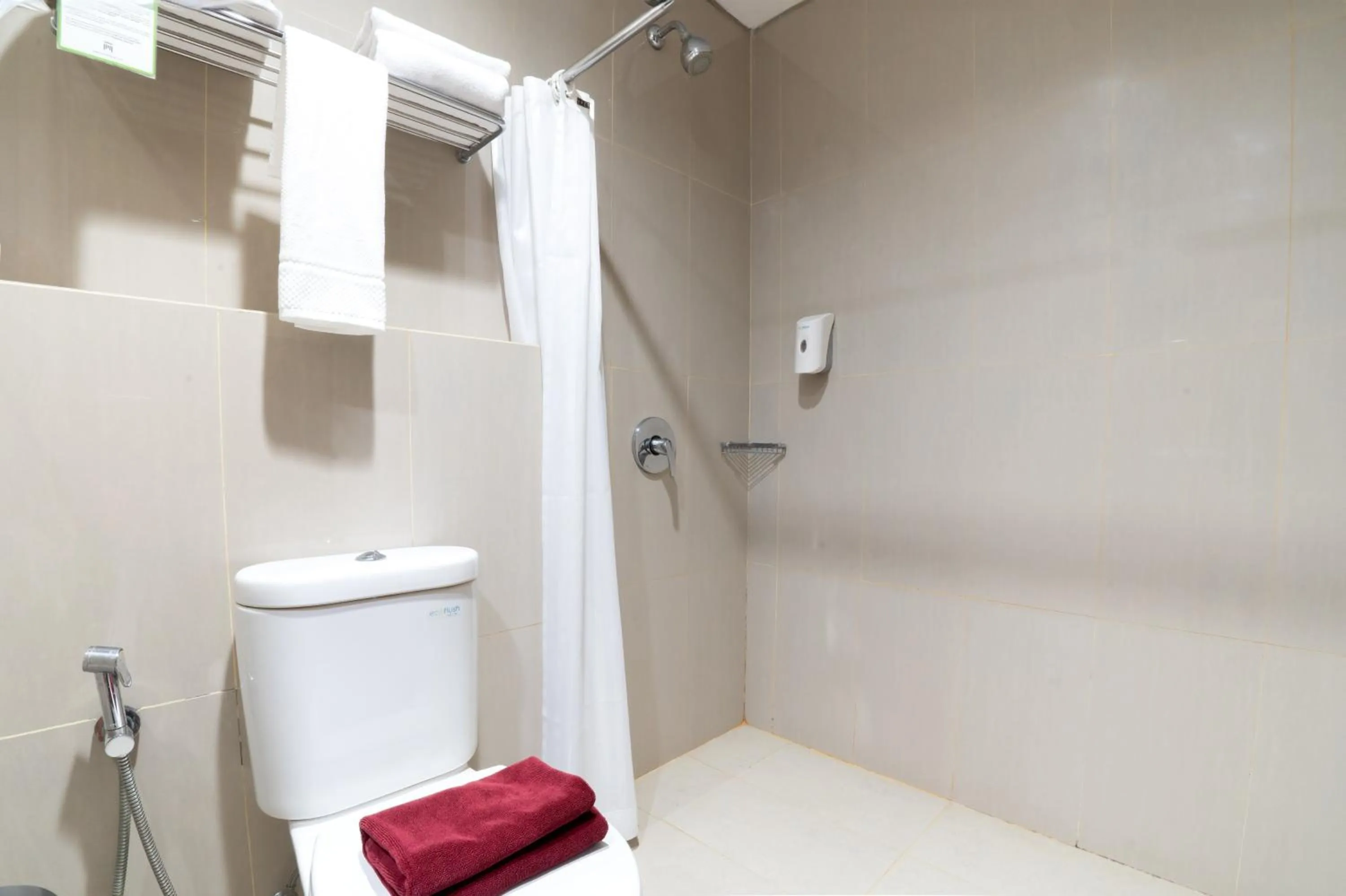 Shower in Atrium Premiere Hotel Yogyakarta Ambarukmo