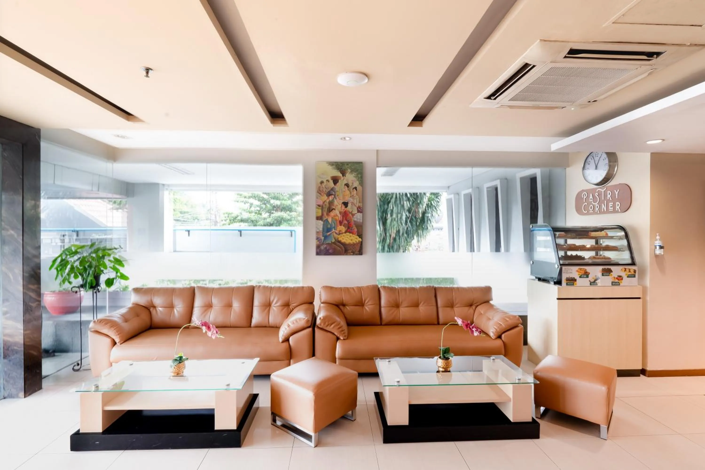 Seating area in Atrium Premiere Hotel Yogyakarta Ambarukmo