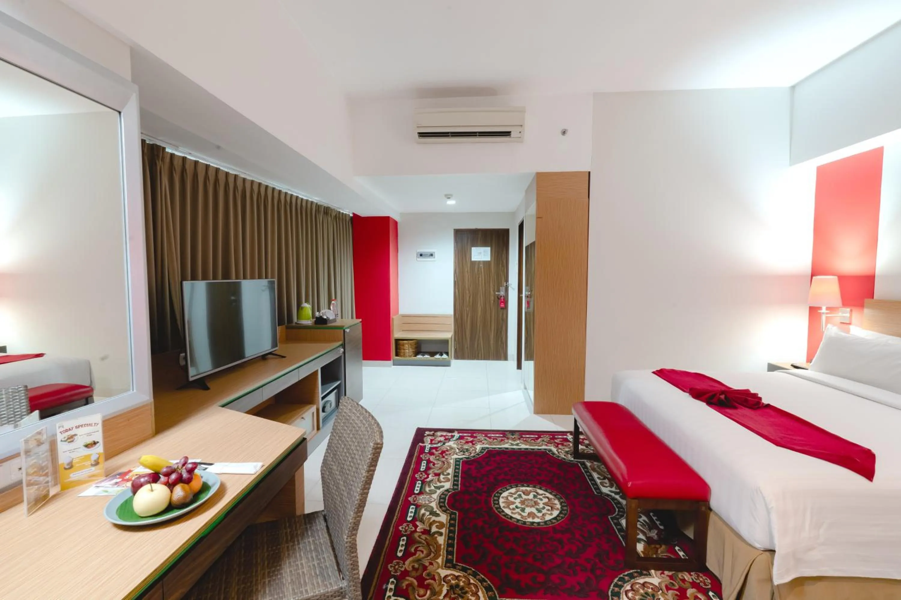 Bed in Atrium Premiere Hotel Yogyakarta Ambarukmo