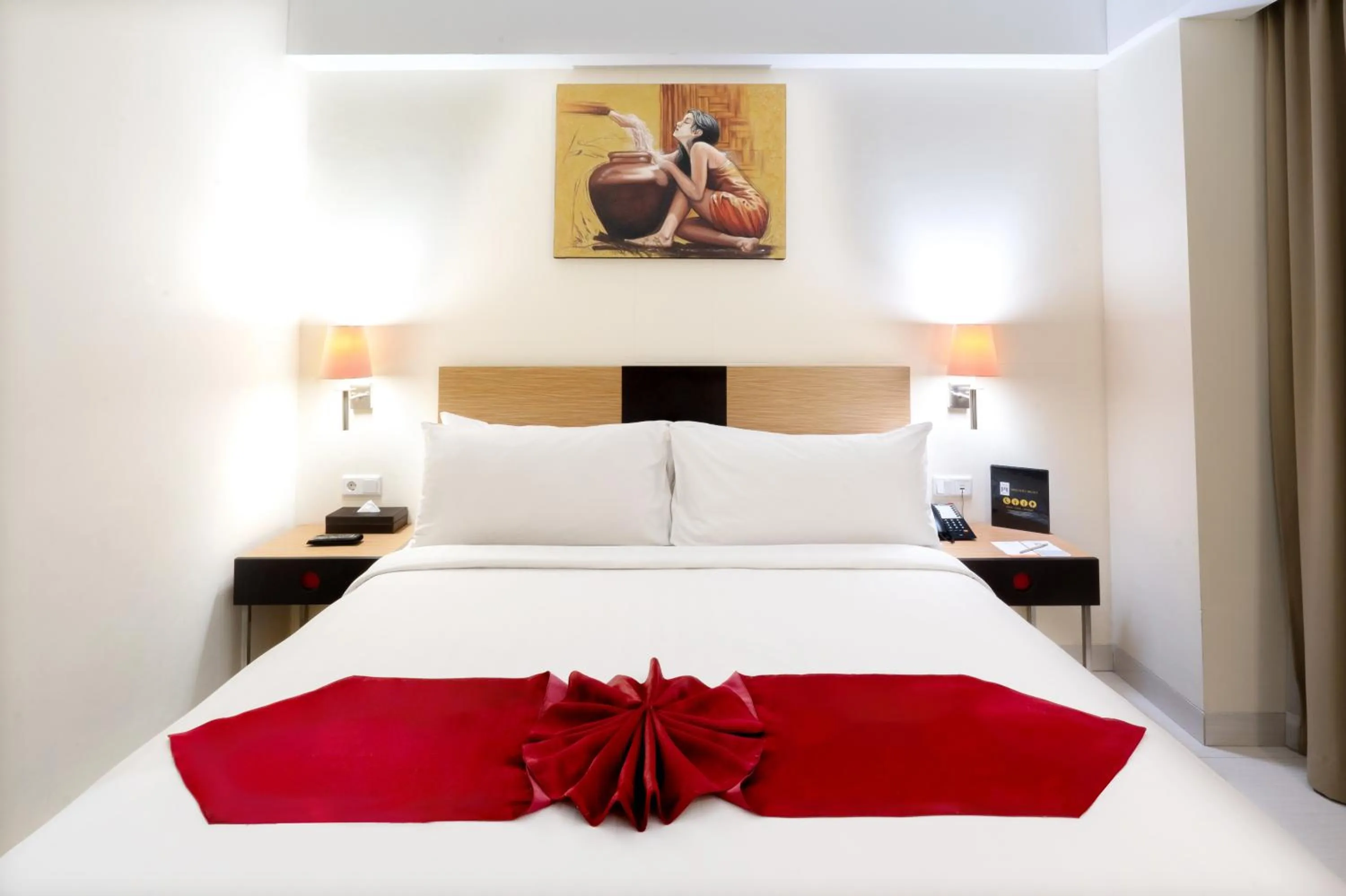 Bed in Atrium Premiere Hotel Yogyakarta Ambarukmo