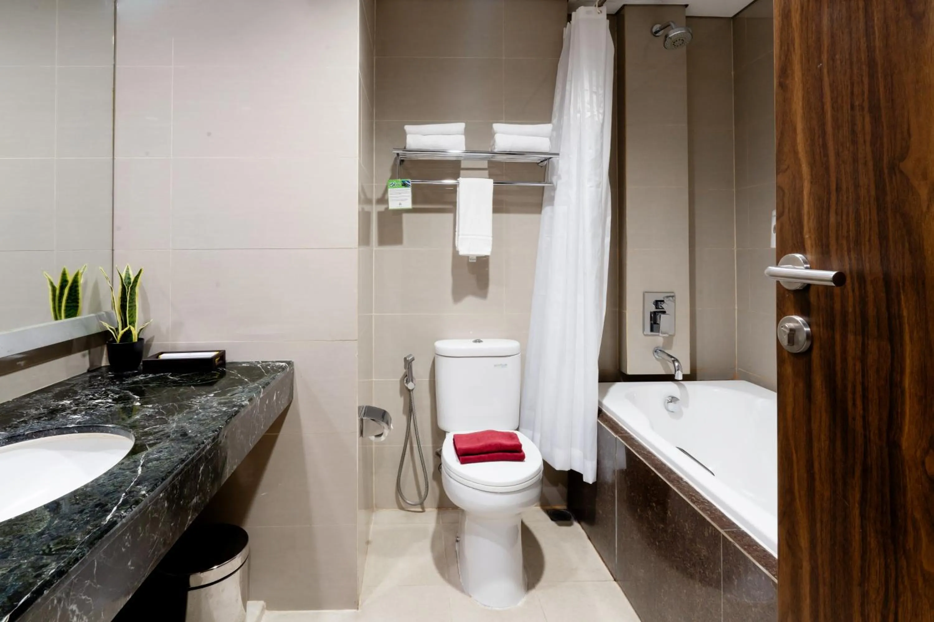 Shower in Atrium Premiere Hotel Yogyakarta Ambarukmo