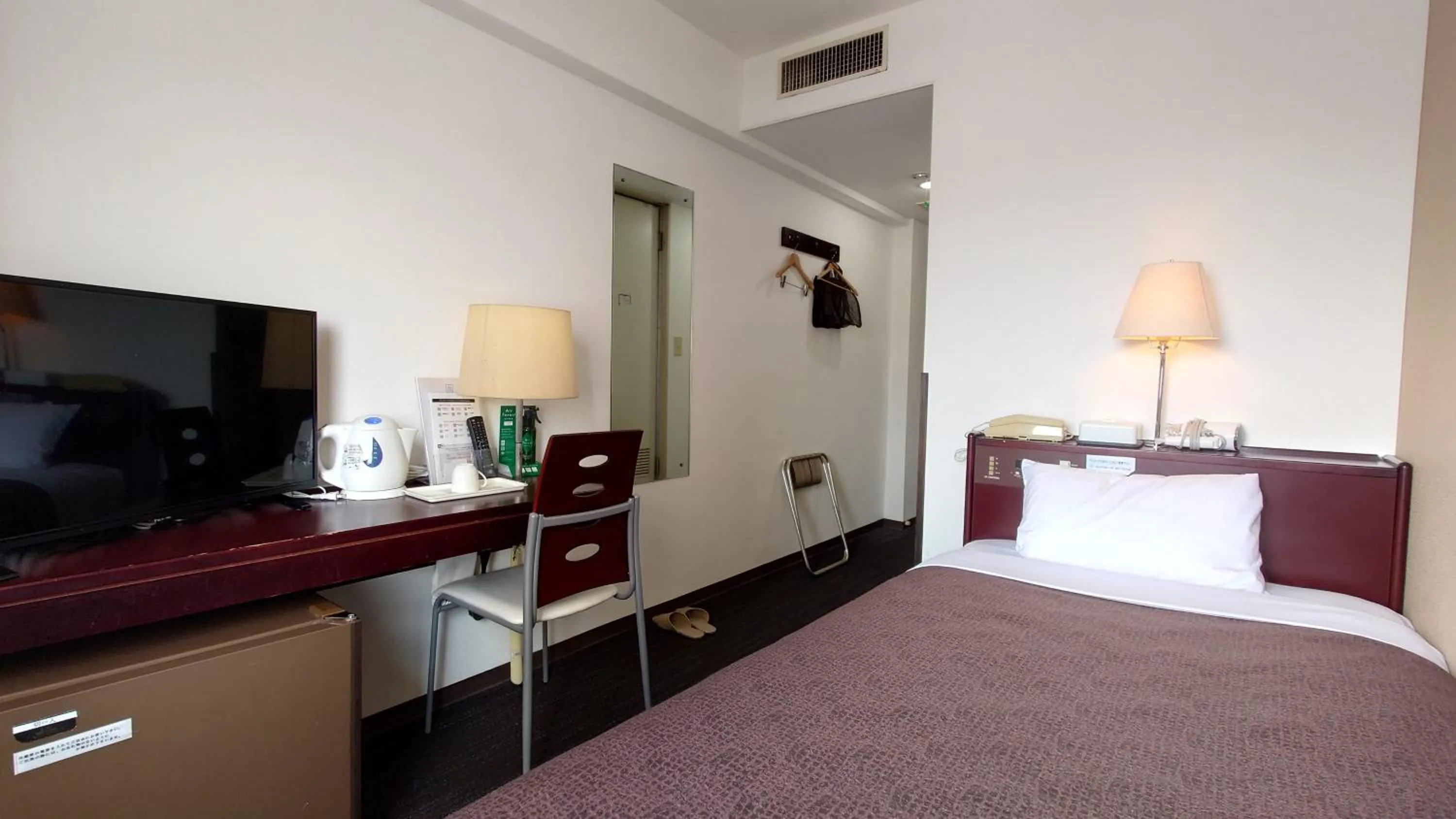 Bed in Select Inn Hamamatsu Ekimae