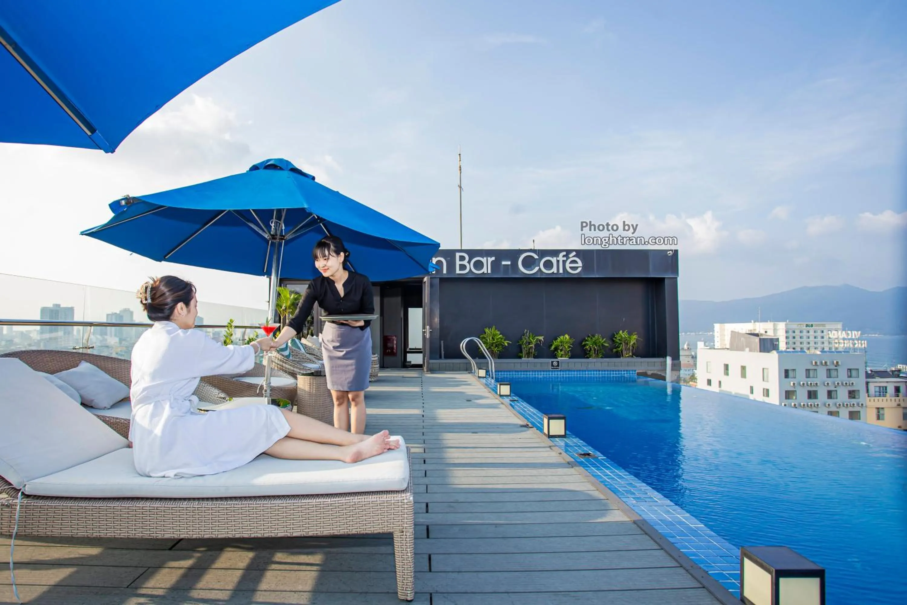 People in Grand Ocean Luxury Boutique - Infinity Rooftop Pool