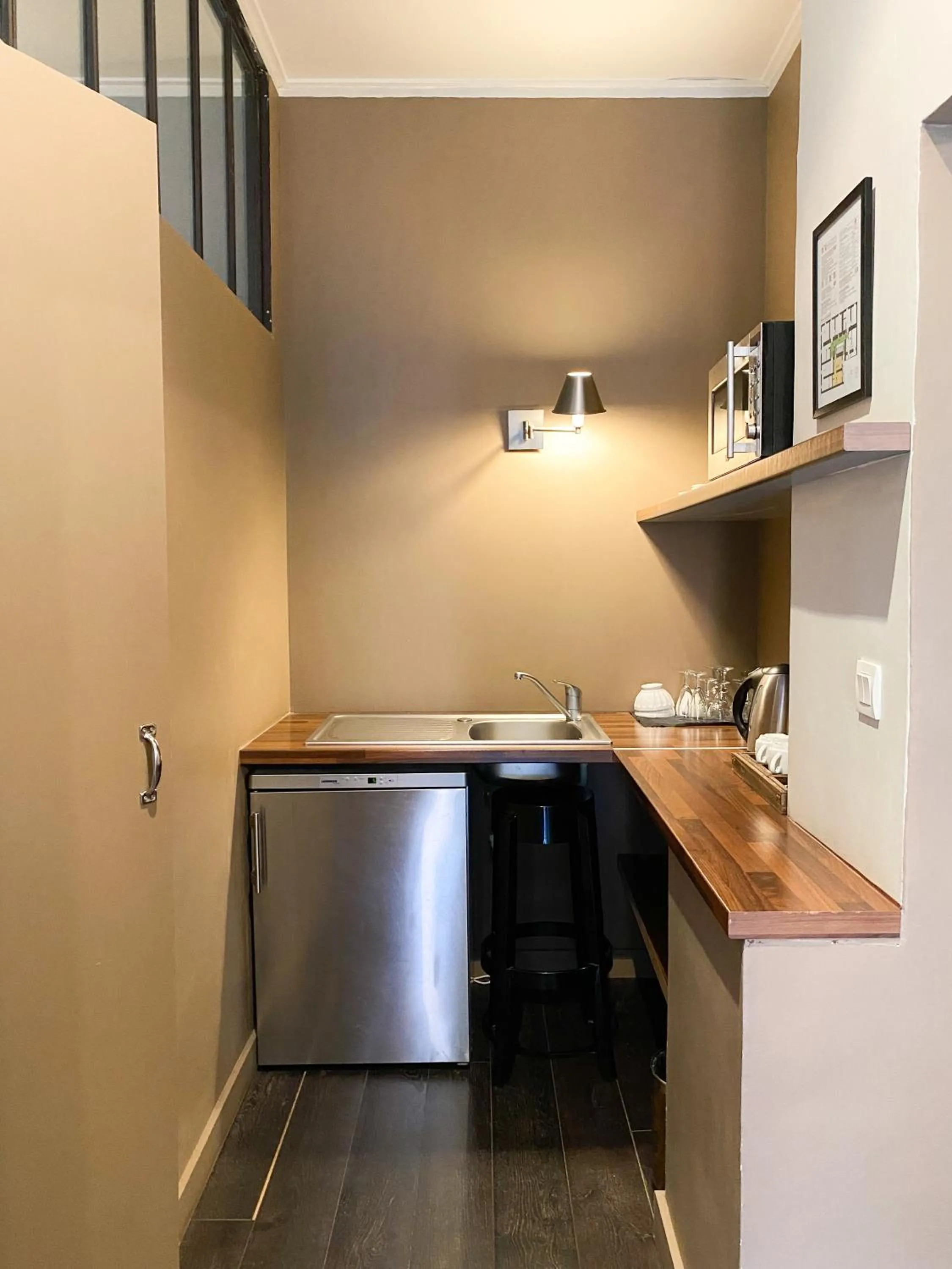 Kitchen or kitchenette in Hotel Central Bastia