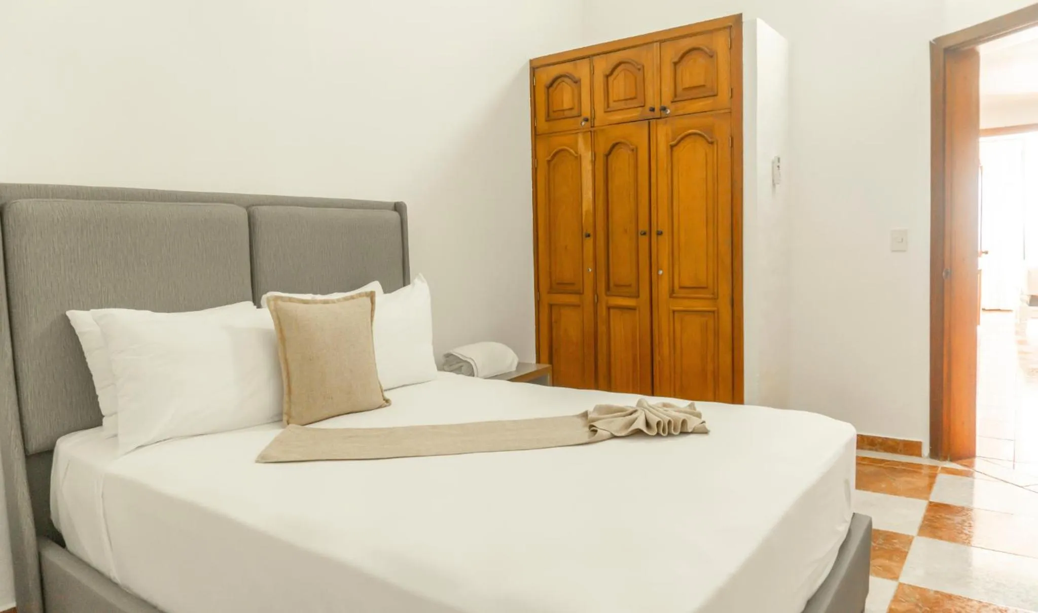 Bed in Hotel Checkin El Cortecito Beach