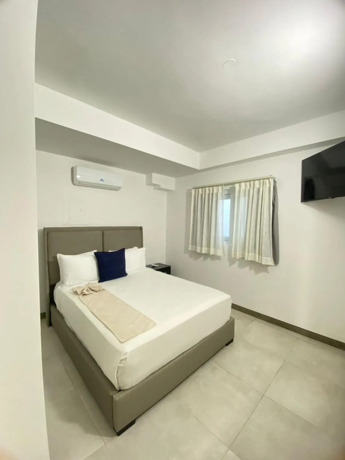 Bed in Hotel Checkin El Cortecito Beach