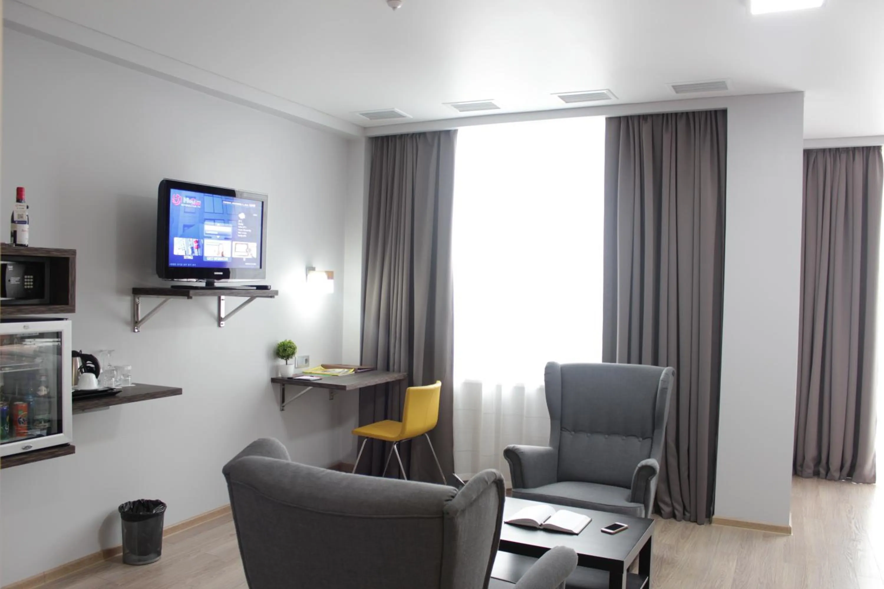 Communal lounge/ TV room in Smart Hotel Bishkek