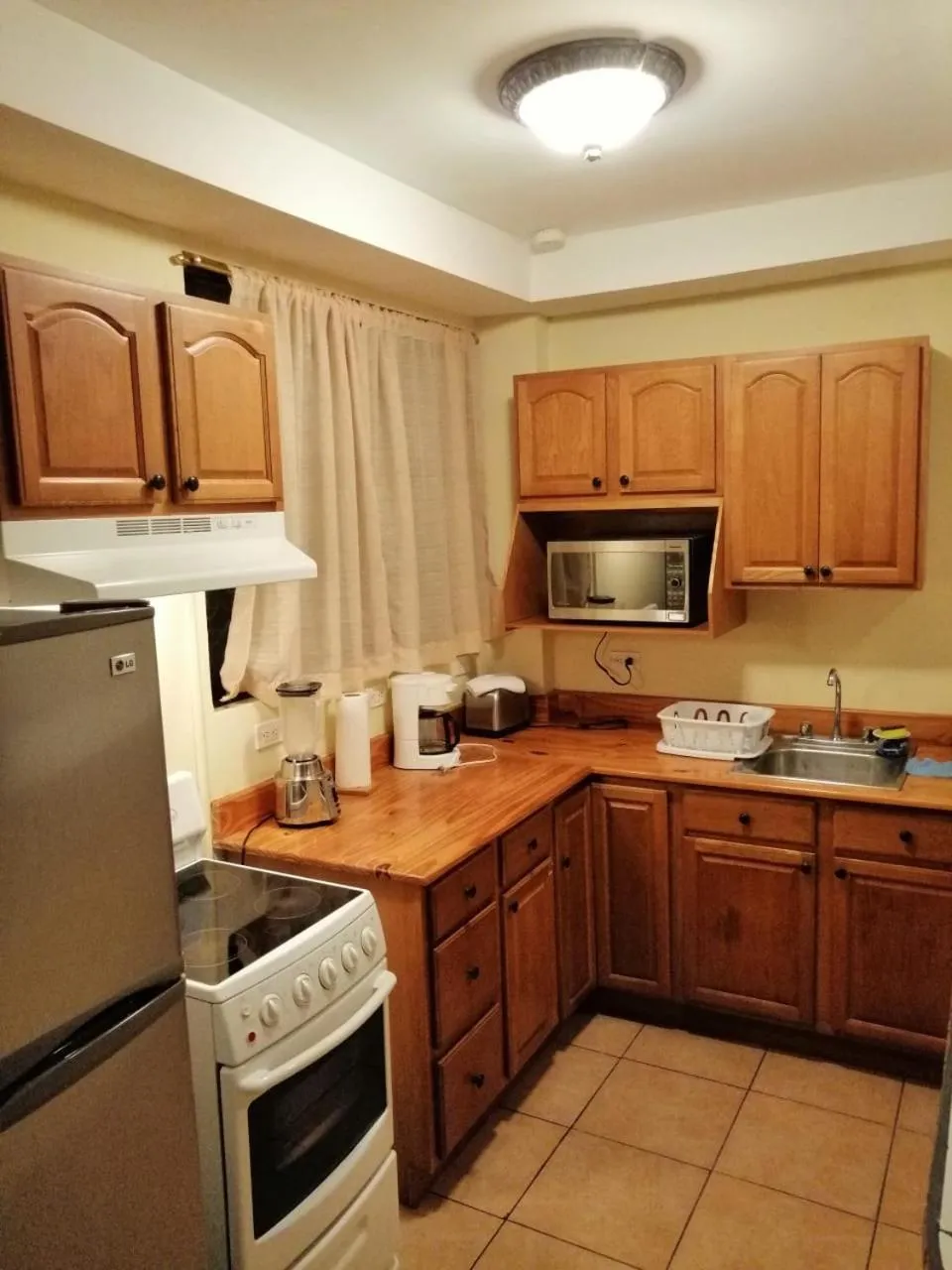 Kitchen or kitchenette in Apartotel Don Francisco