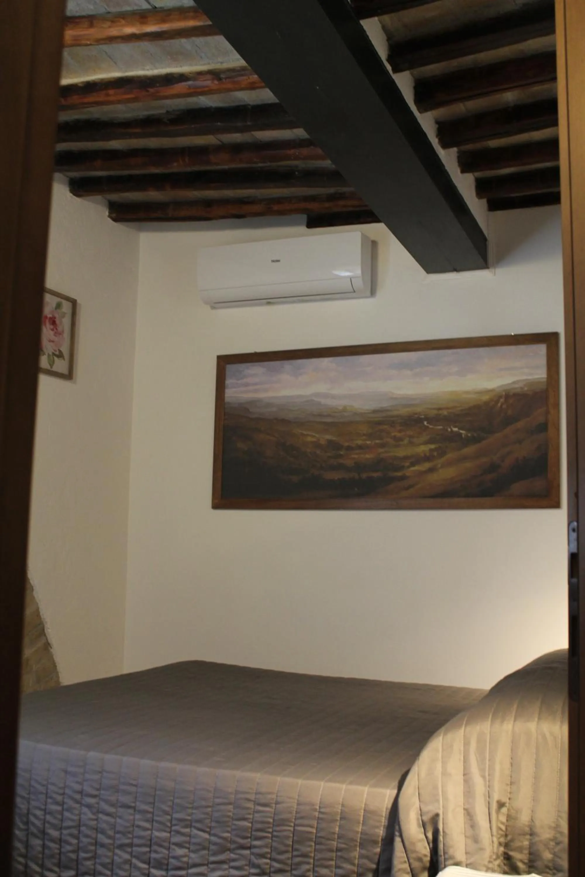 Bed in Alter Ego b&b Assisi