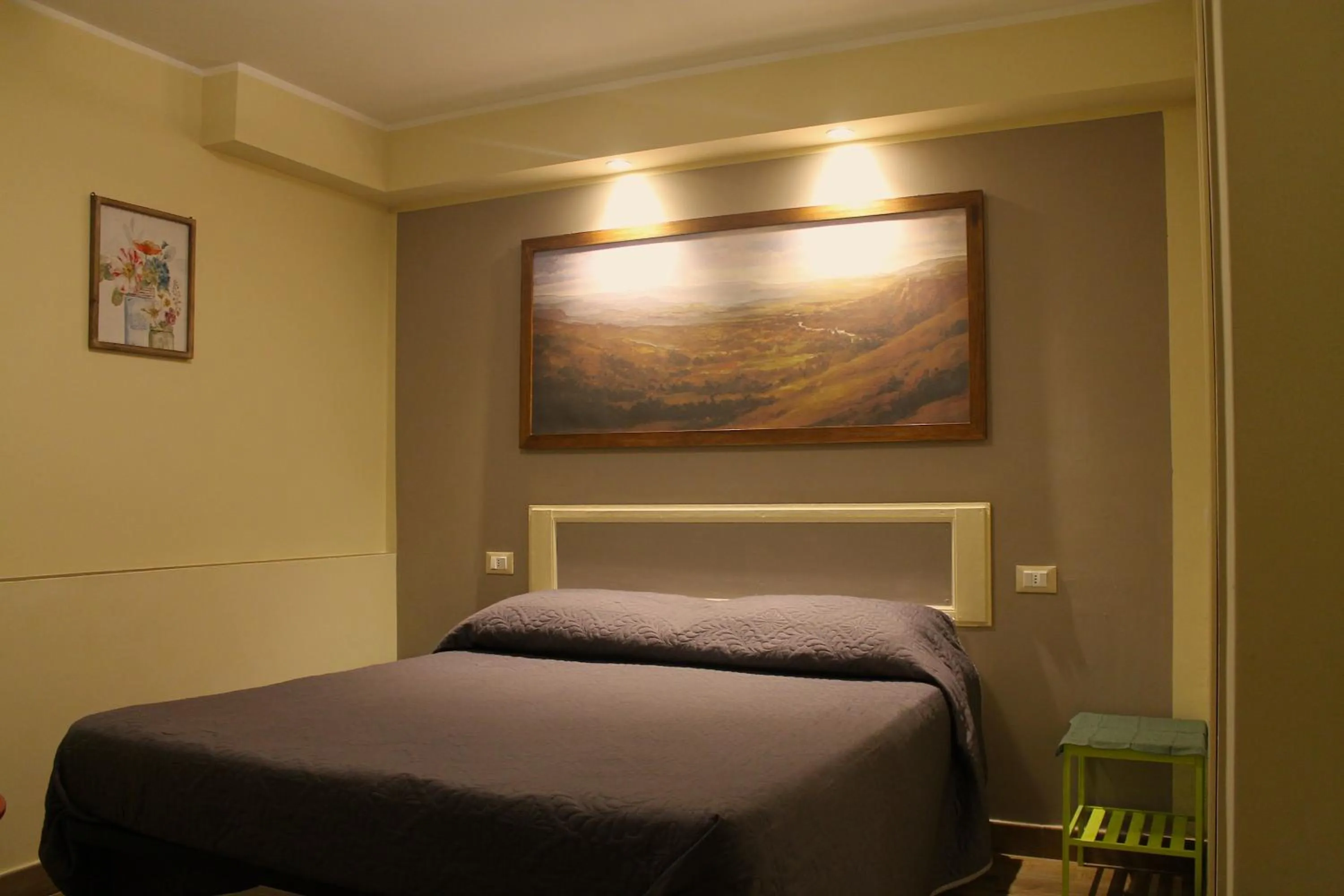 Bed in Alter Ego b&b Assisi